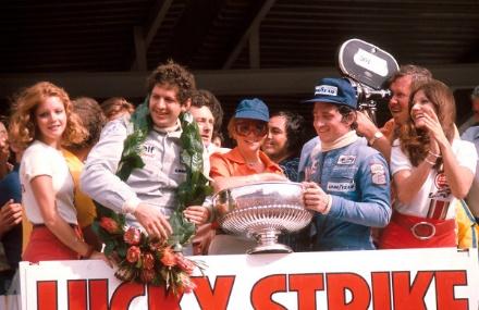 1975 South African GP in Kyalami. Jody Scheckter (Tyrrell Ford), 1st position, with teammate Patrick Depailler (Tyrrel Ford), 3rd position, on the podium.
