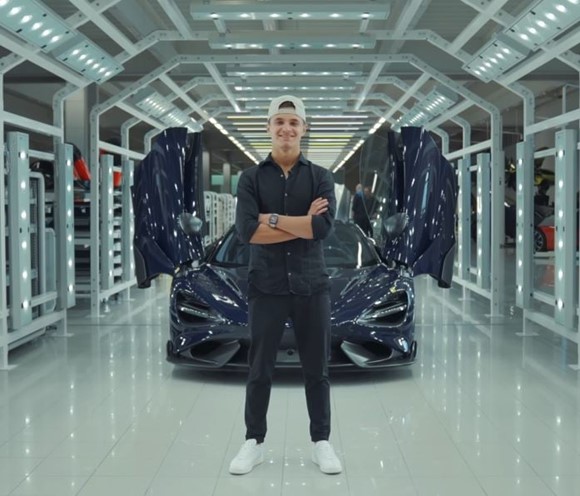 Lando Norris with one of his cars.