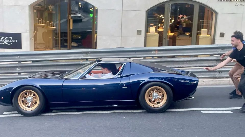 Lando Norris' gorgeous Lamborghini Miura stalls in the street and needs to be pushed to start at Monaco in 2024.