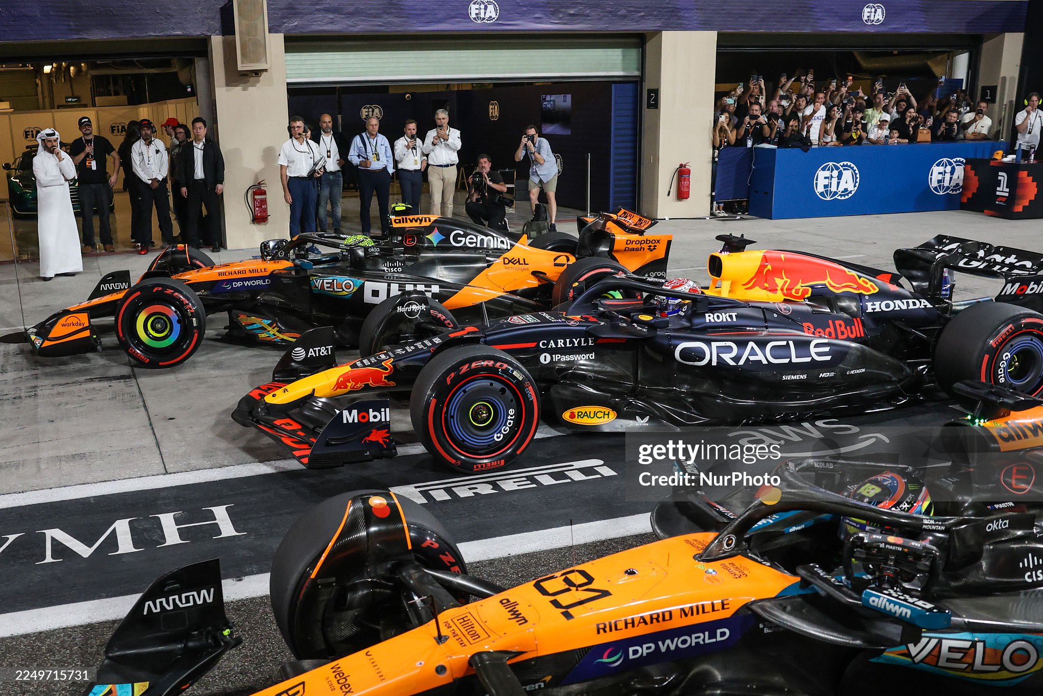 Max Verstappen of Red Bull Racing, Lando Norris of McLaren and Oscar Piastri of McLaren after the qualifying session ahead of the Formula 1 Abu Dhabi Grand Prix at Yas Marina circuit on 06 December 2025. 