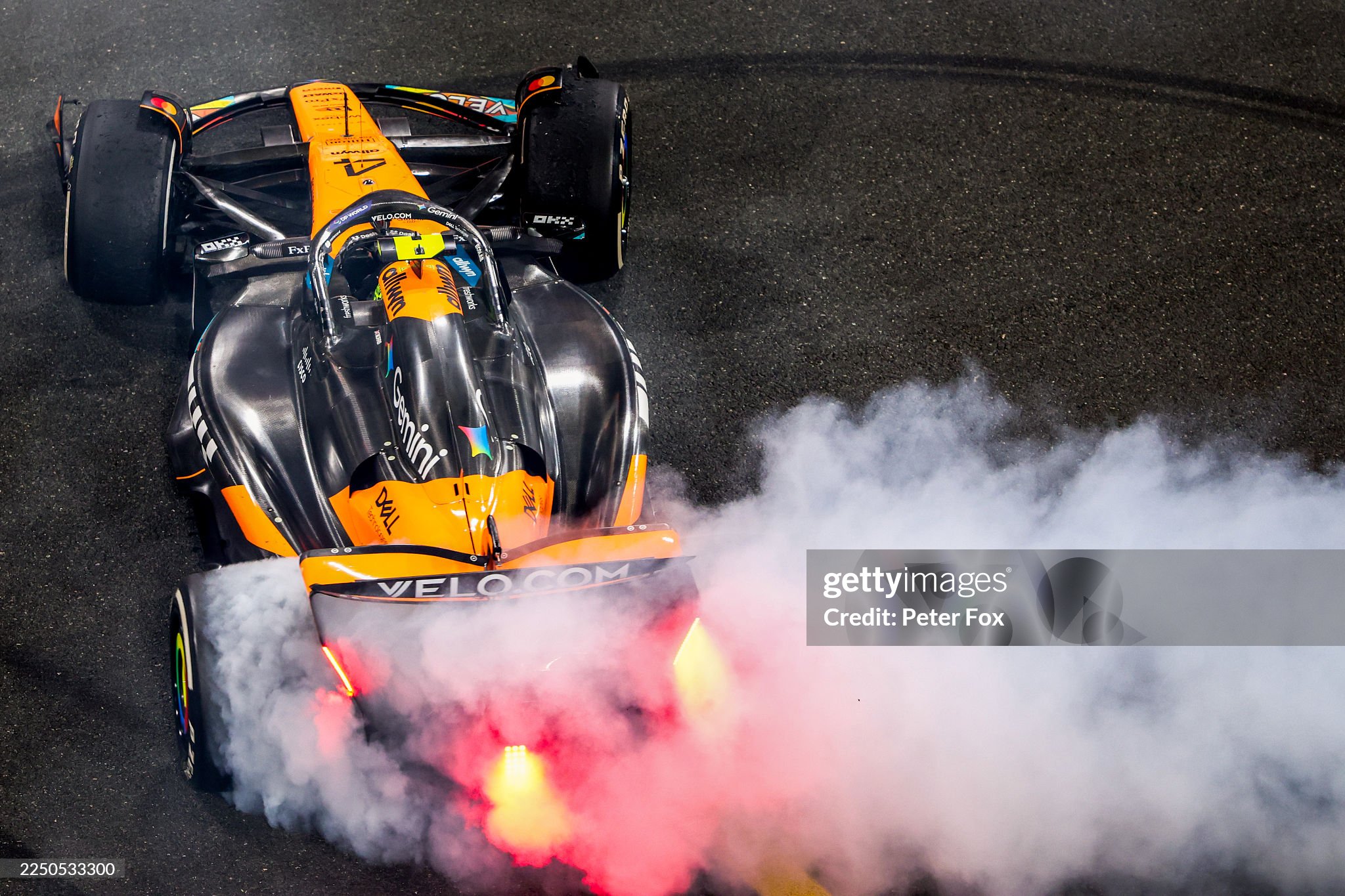 World Drivers Champion and third placed Lando Norris performs donuts in celebration after the F1 Grand Prix of Abu Dhabi at Yas Marina Circuit on 07 December 2025. 