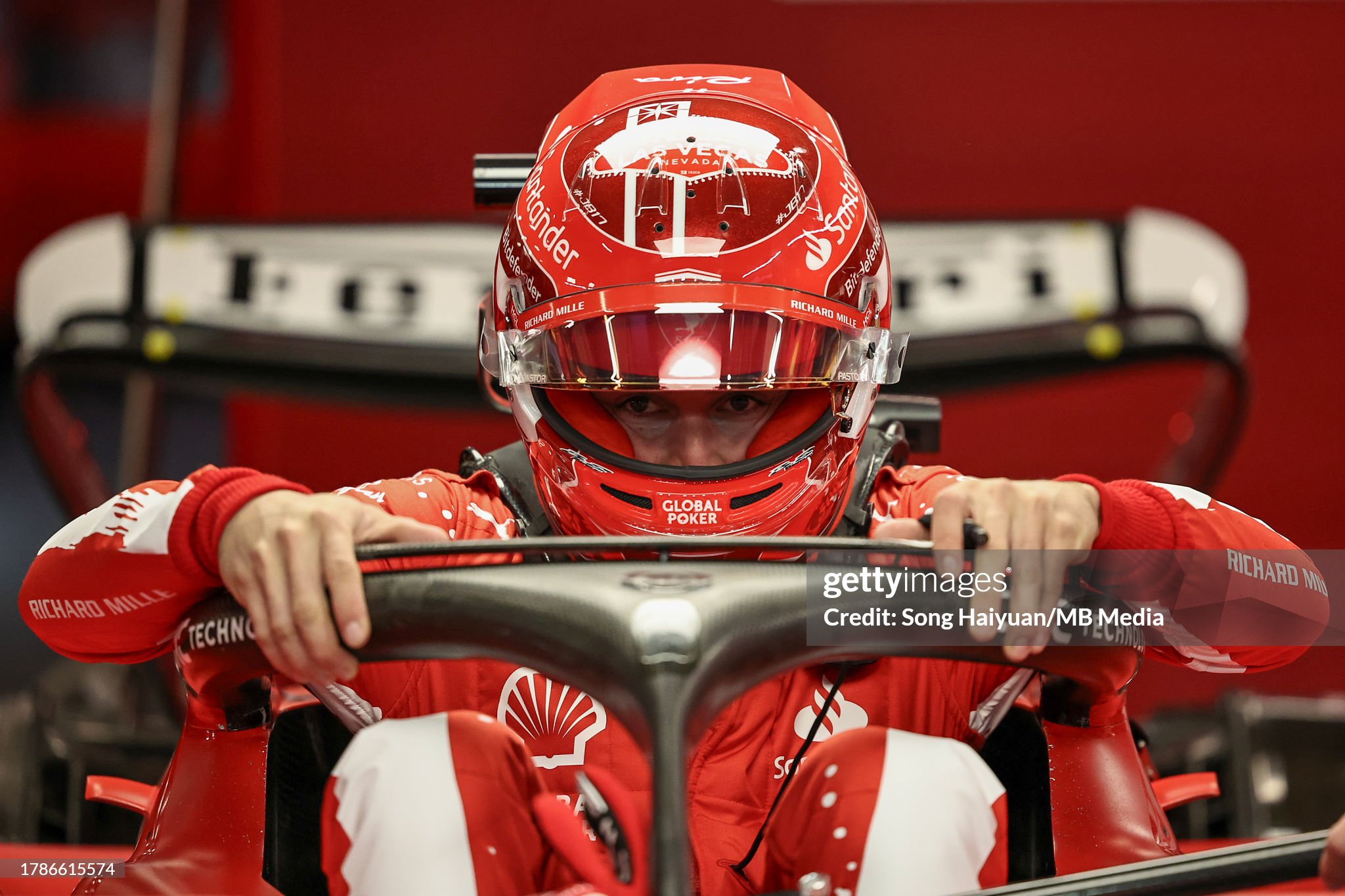 Charles Leclerc gets into his Ferrari SF-23 in the garage during practice ahead of the F1 Grand Prix of Las Vegas on 16 November 2023. 