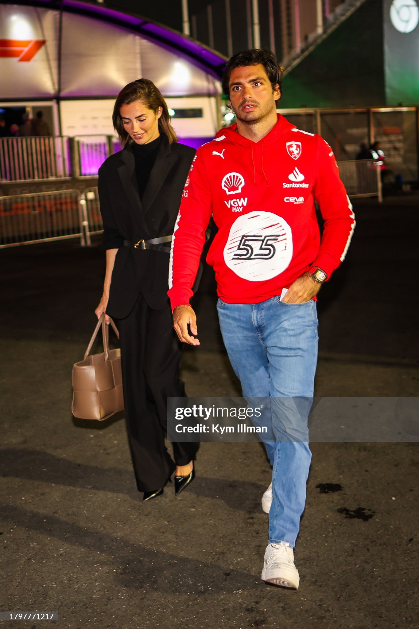 Carlos Sainz of Spain and Ferrari F1 team enters the paddock with girlfriend Rebecca Donaldson during practice ahead of the F1 Grand Prix of Las Vegas at Las Vegas Strip Circuit on 16 November 2023. 