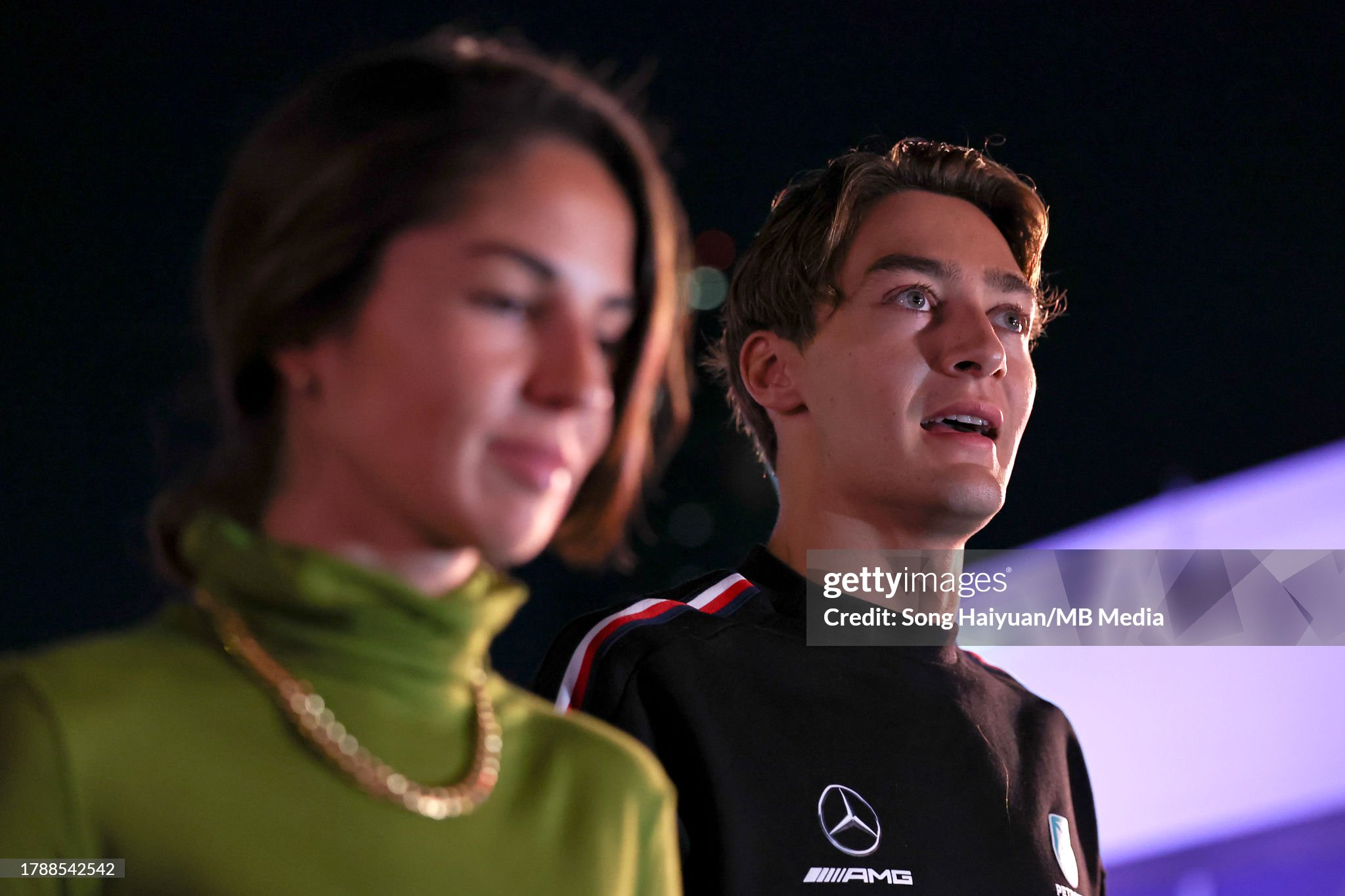 George Russell and Carmen Montero Mundt arrive at the track during qualifying ahead of the F1 Grand Prix of Las Vegas on 17 November 2023 in Las Vegas, Nevada. 