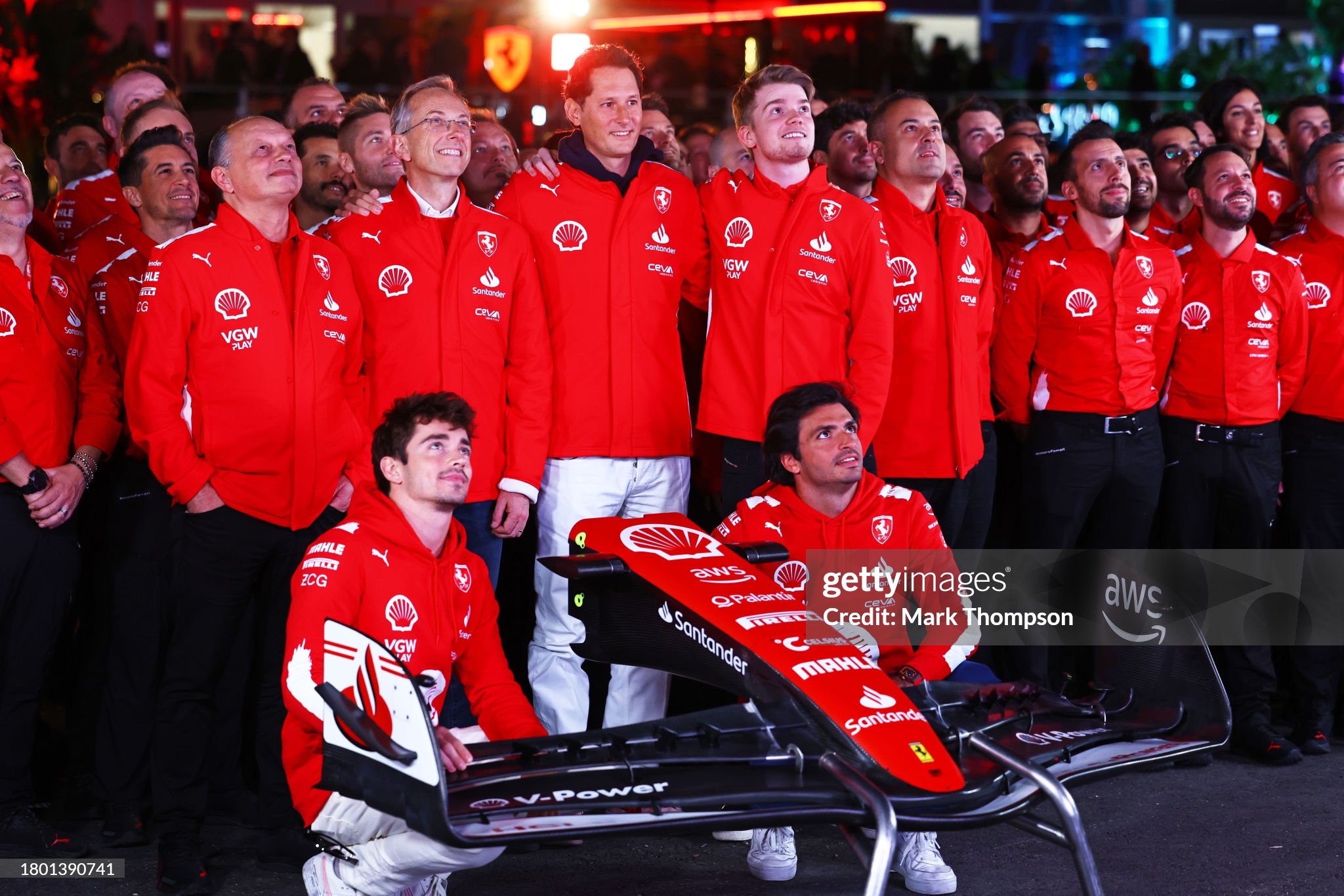 Charles Leclerc of Monaco and Ferrari and Carlos Sainz of Spain and Ferrari pose for a photo with Ferrari team members in the pitlane prior to the F1 Grand Prix of Las Vegas at Las Vegas Strip Circuit on November 18, 2023 in Las Vegas, Nevada. 