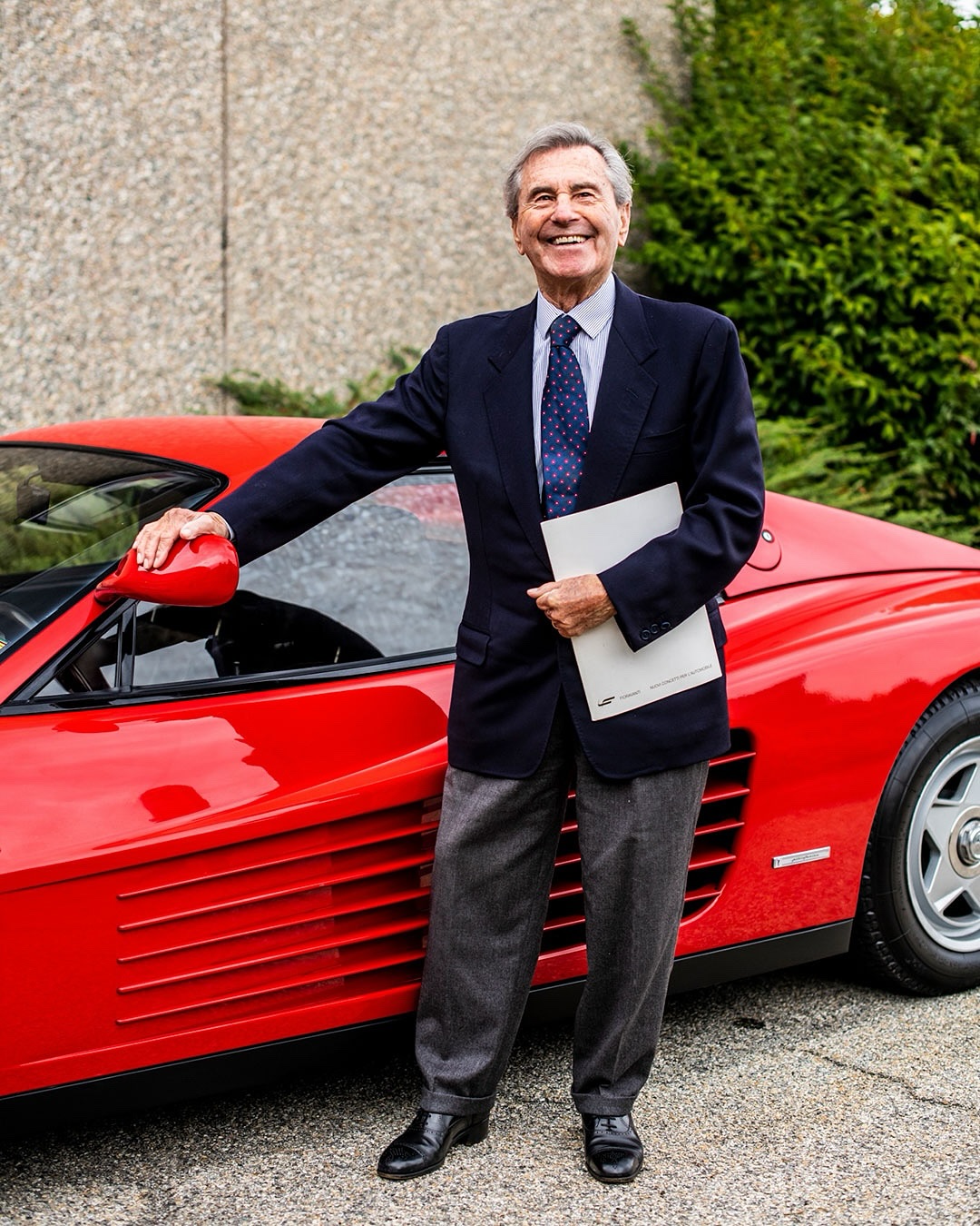 Leonardo Fioravanti and a red Ferrari.