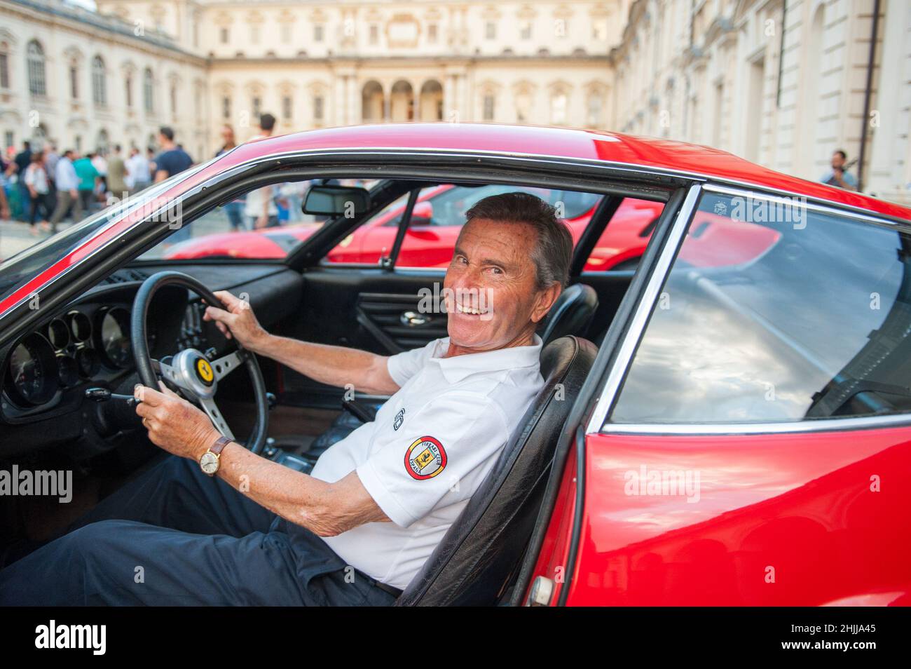Leonardo Fioravanti in a red Ferrari Daytona.