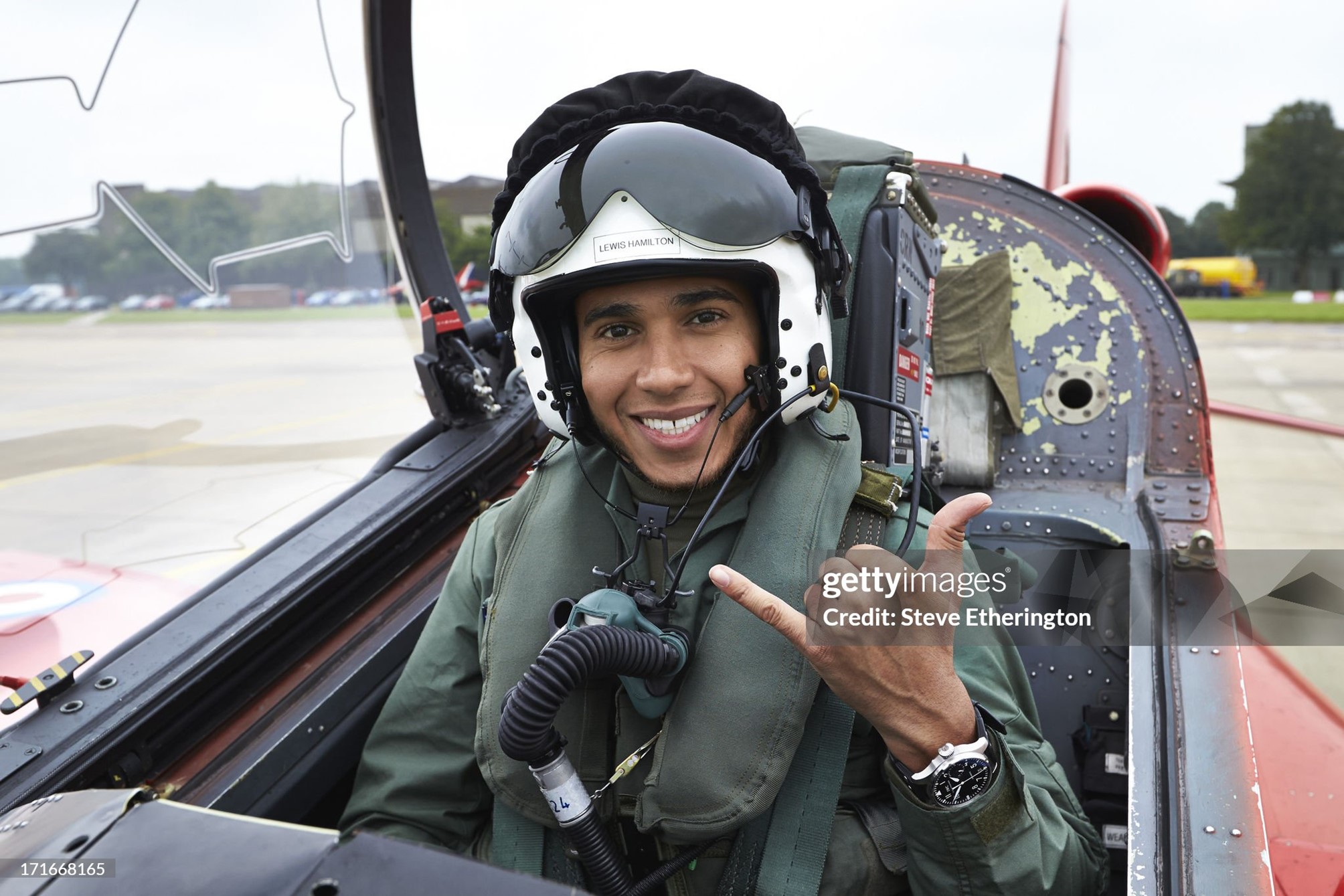 Lewis Hamilton, Mercedes, takes part in a training and flying session with Red Arrows at RAF Scampton, Lincolnshire, England, on 21 June 2013. 