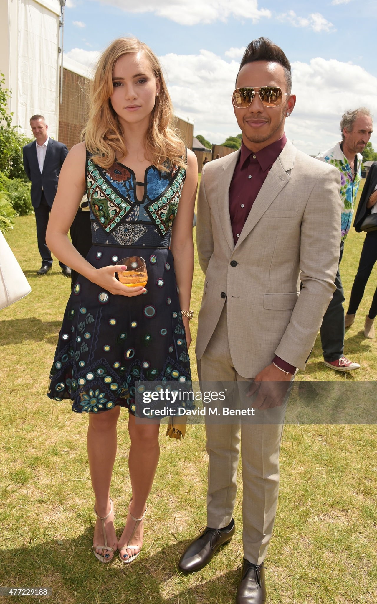 Suki Waterhouse and Lewis Hamilton at the Burberry Menswear Spring Summer 2016 show at Kensington Gardens on 15 June 2015 in London, England. 