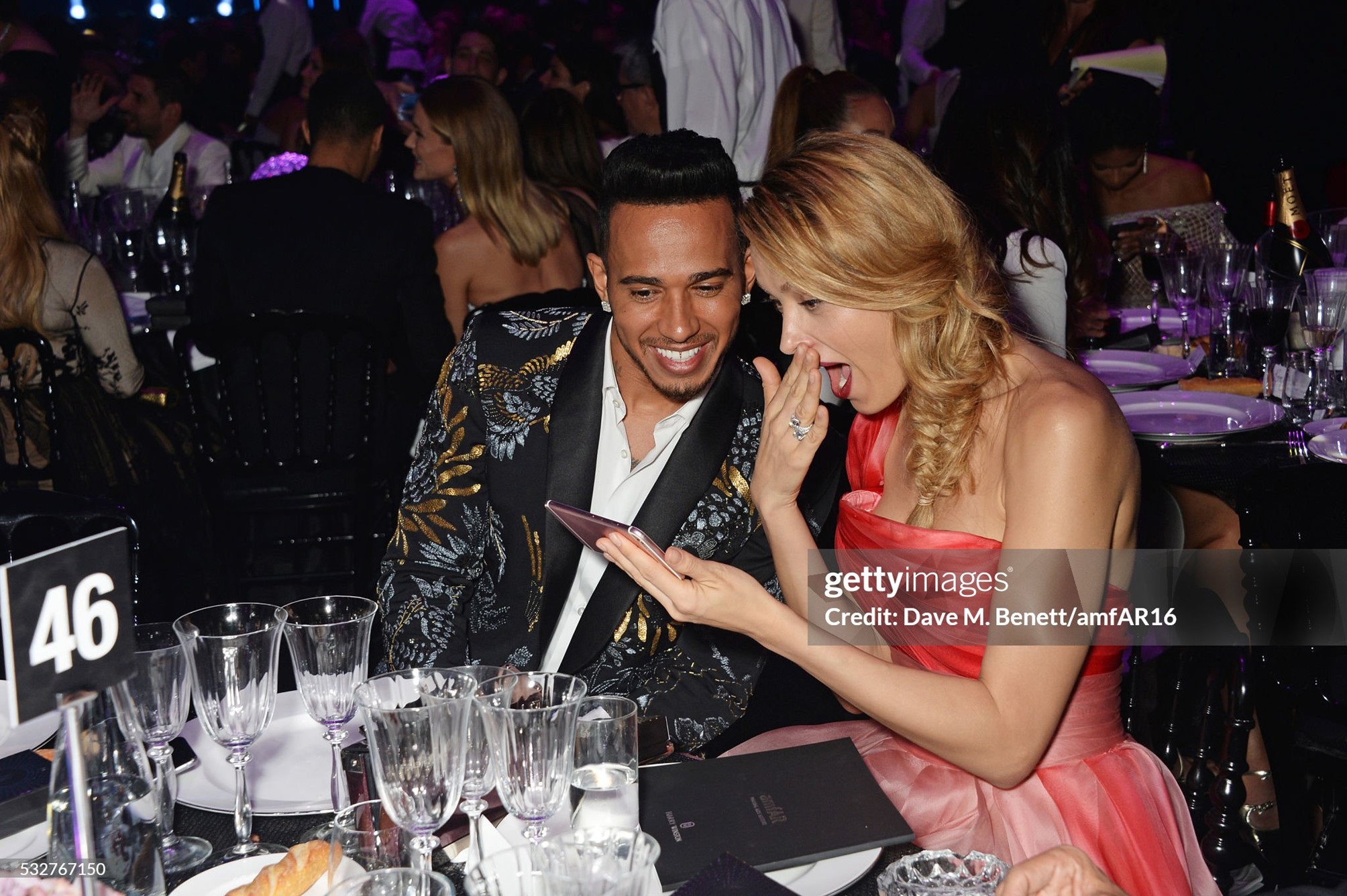 Lewis Hamilton and Petra Nemcova attend amfAR's 23rd Cinema Against AIDS Gala at Hotel du Cap-Eden-Roc in Cap d'Antibes, France, on 19 May 2016. 