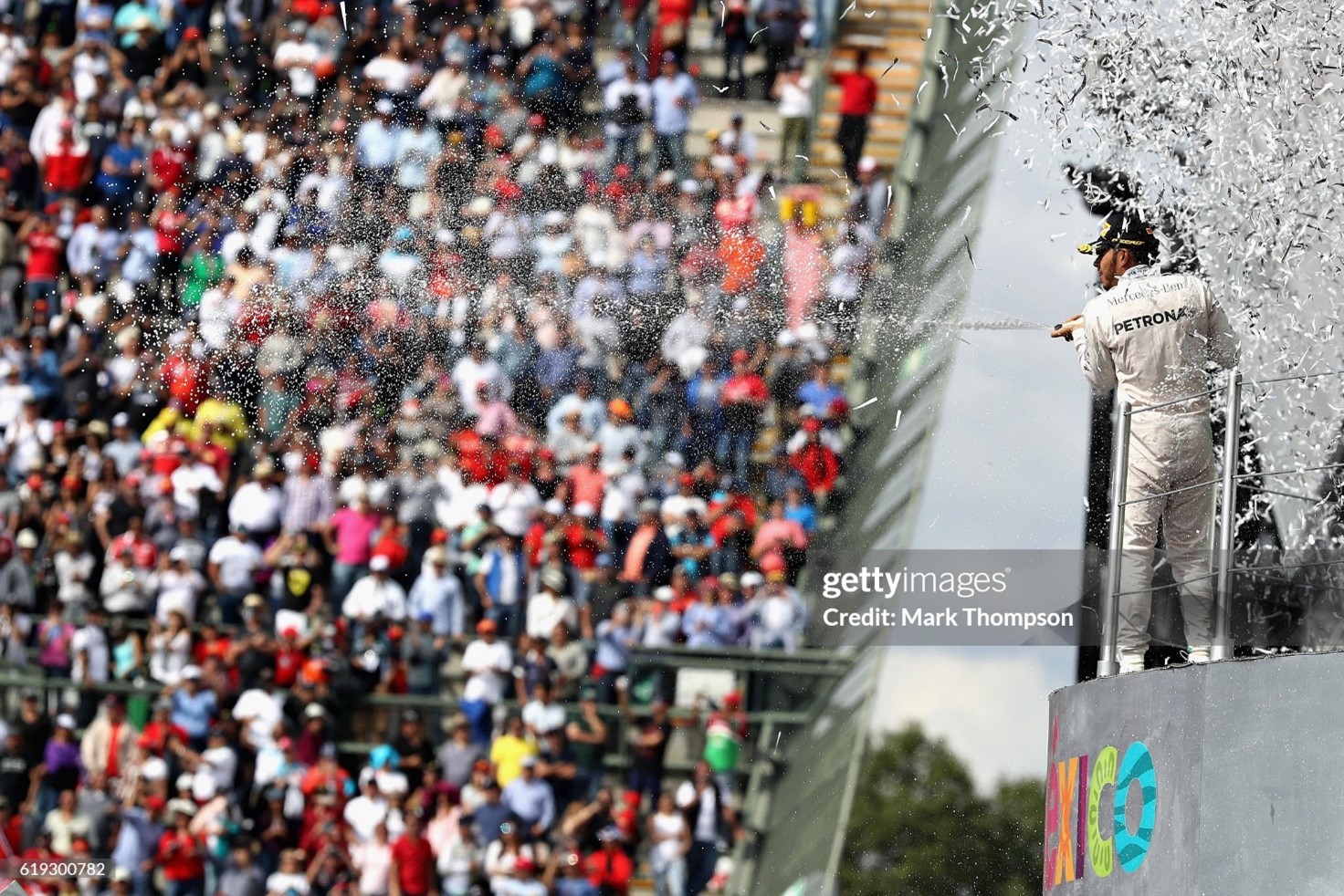 Lewis Hamilton celebrates his win on the podium after the Formula One Grand Prix of Mexico at Autodromo Hermanos Rodriguez in Mexico City, Mexico, on 30 October 2016.