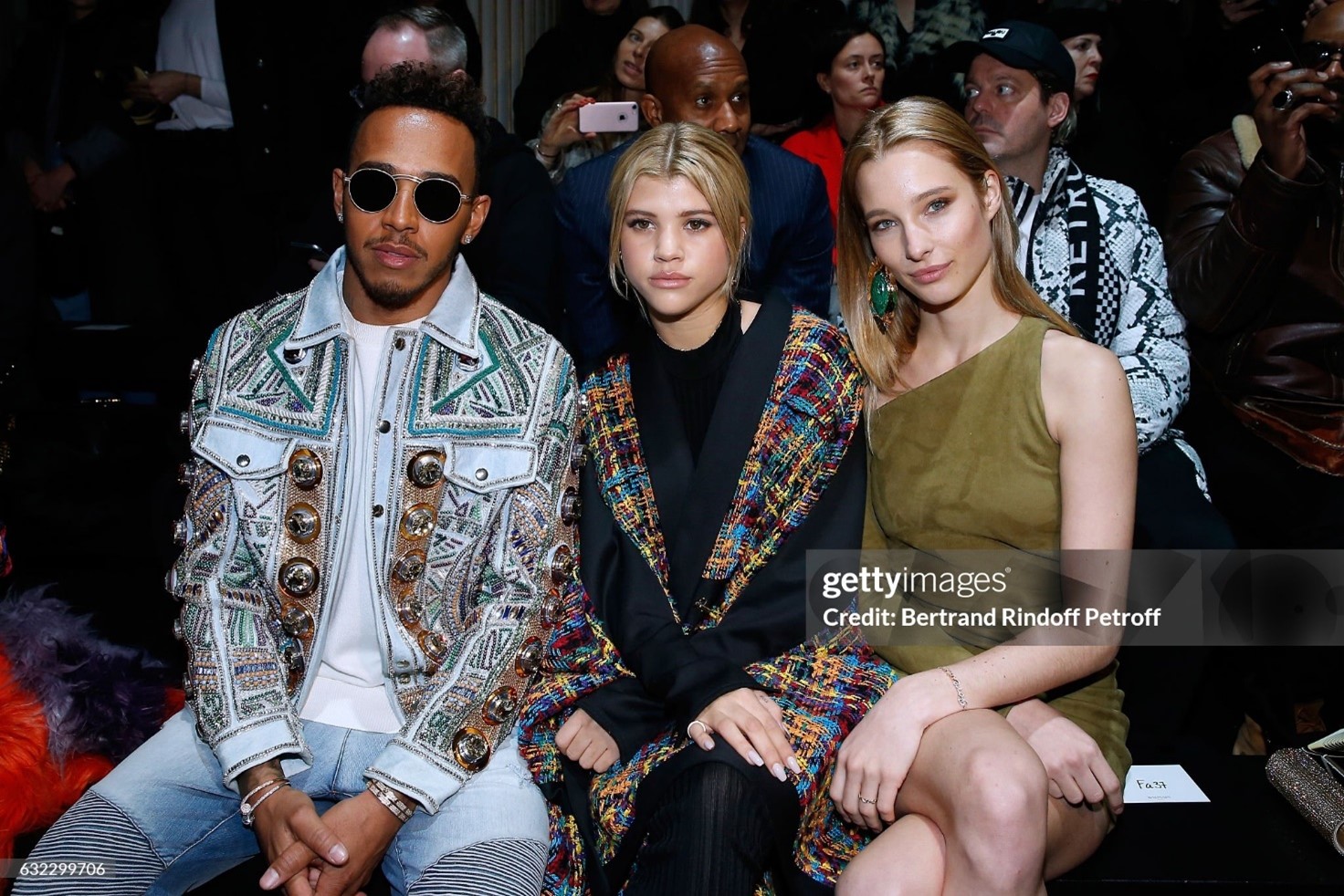 Lewis Hamilton, Sofia Richie and Ilona Smet attend the Balmain Menswear Fall Winter 2017-2018 show as part of Paris Fashion Week on 21 January 2017. 