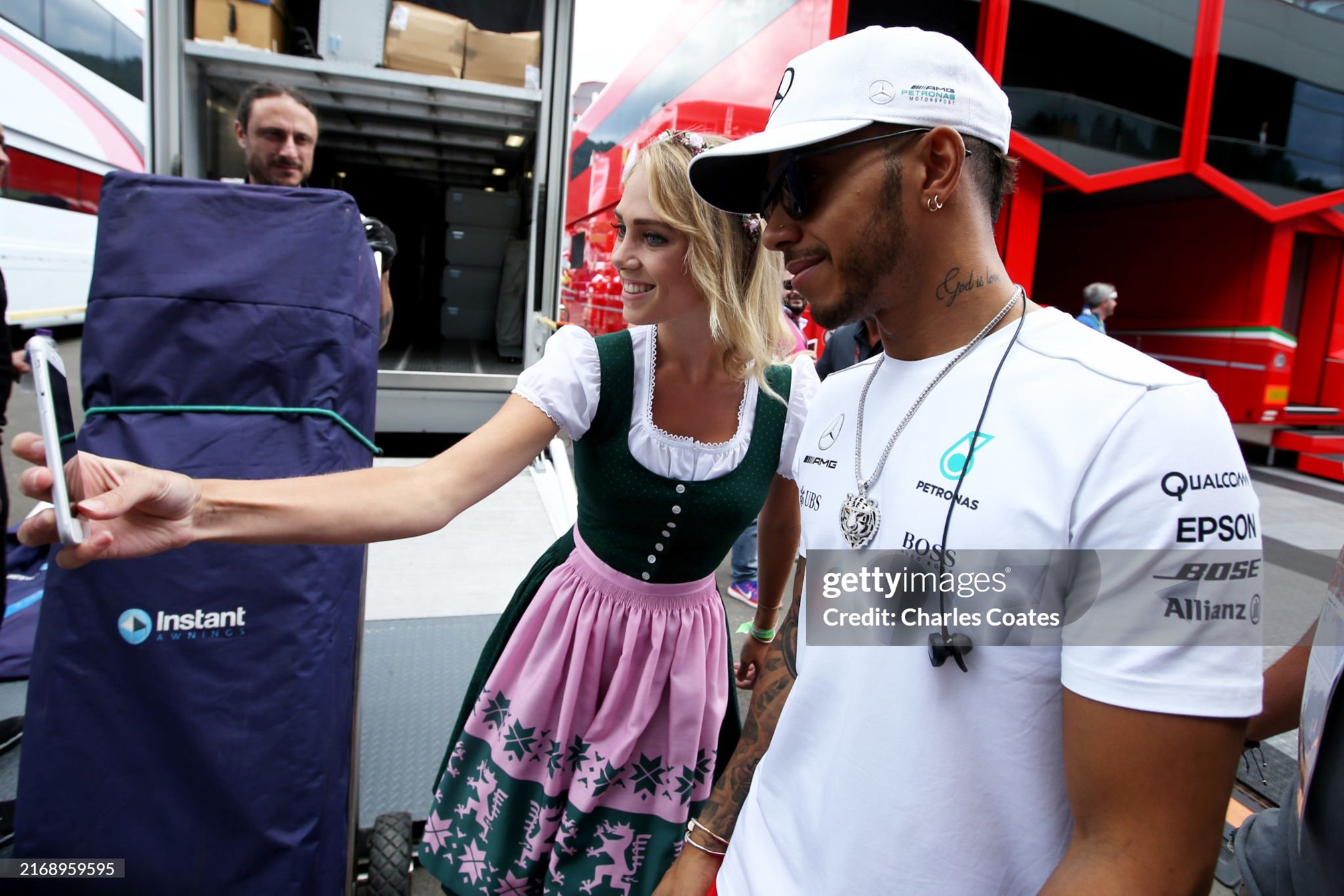 Lewis Hamilton, Mercedes AMG, has his photo taken with a grid girl at Red Bull Ring, Spielberg, on Sunday 09 July 2017. 