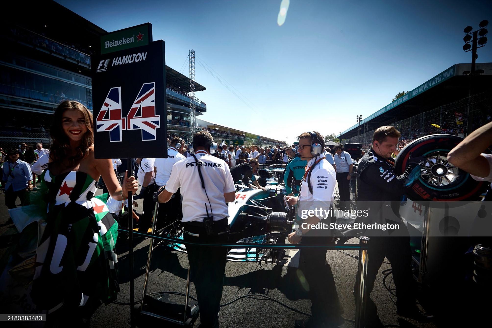 The Mercedes team and a grid girl around the car of Lewis Hamilton on the grid in Monza, Italy, on Sunday 03 September 2017. 