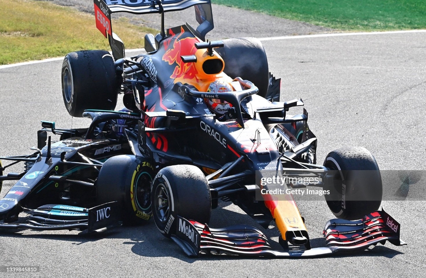 Max Verstappen and Lewis Hamilton crash during the F1 Grand Prix of Italy at Autodromo di Monza on September 12, 2021. 