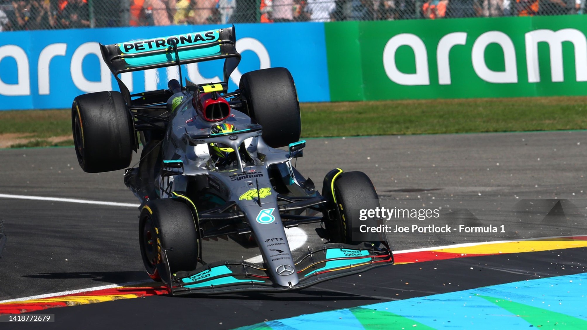 Lewis Hamilton lands on the run off area after a crash during the F1 Grand Prix of Belgium at Circuit de Spa-Francorchamps in Spa, Belgium, on 28 August 2022. 