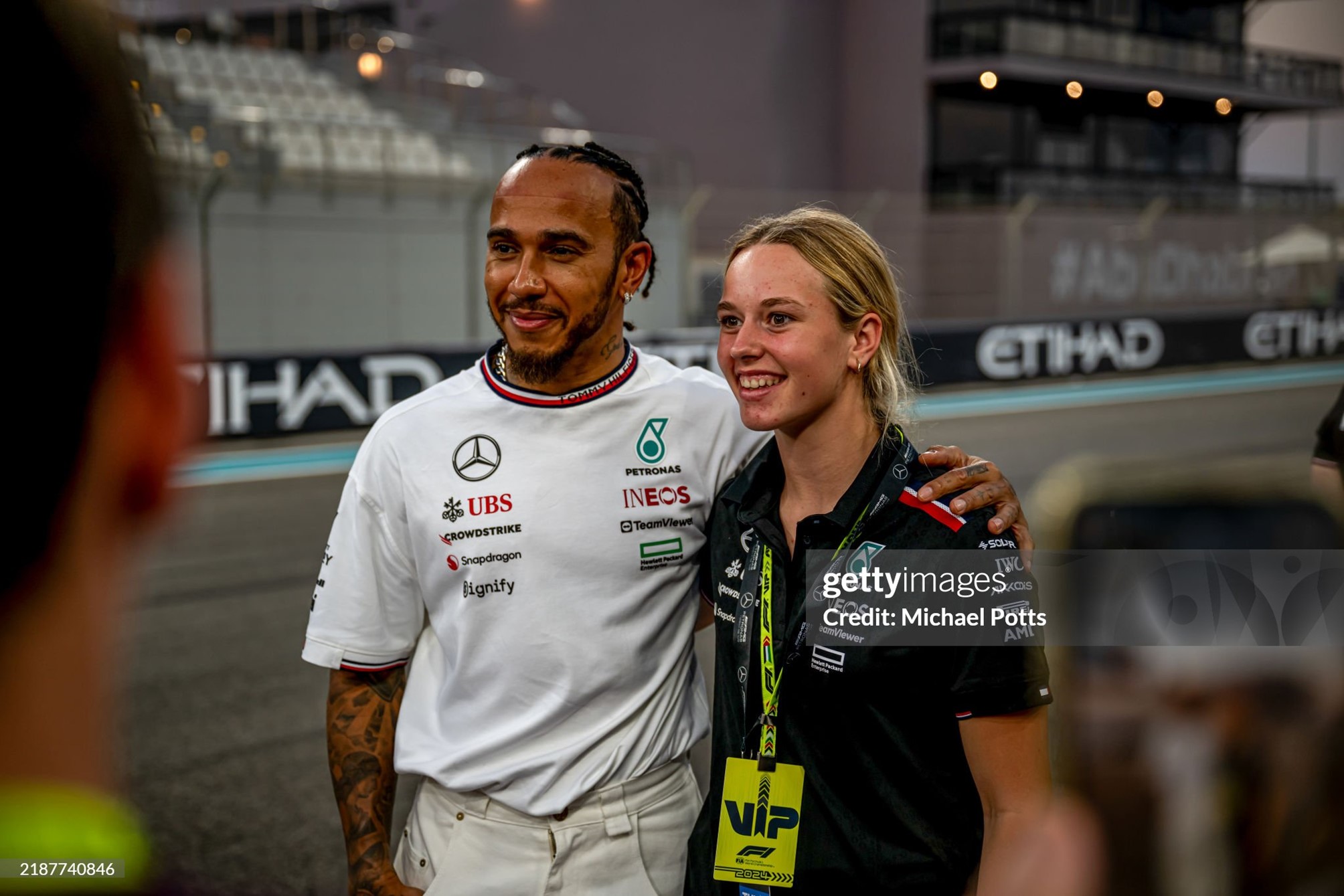 Lewis Hamilton and a girl during previews ahead of F1 Grand Prix of Abu Dhabi on December 05, 2024. 