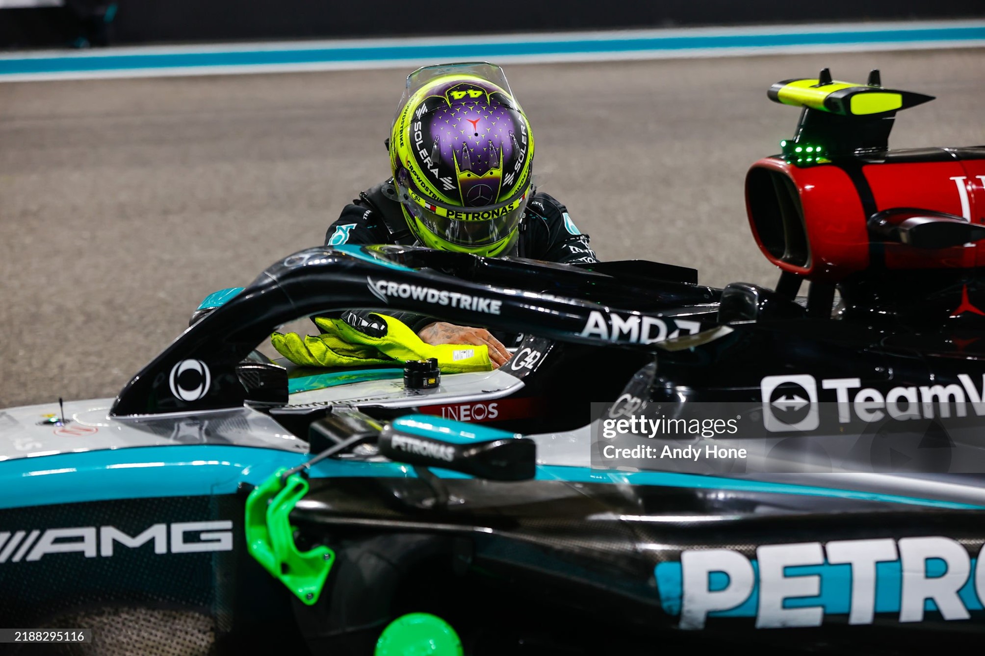 Lewis Hamilton with his hands on his Mercedes bids farewell to the car with which he won everything after the F1 Grand Prix of Abu Dhabi at Yas Marina Circuit on 08 December 2024. 