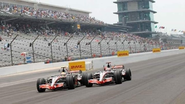 Lewis Hamilton fighting with Fernando Alonso when they were at McLaren.