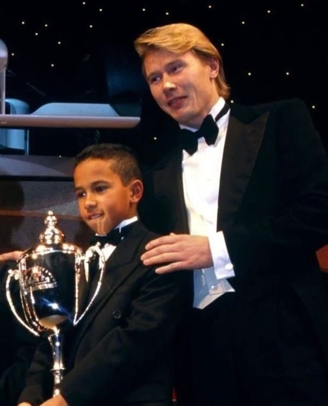 Mika Hakkinen and Lewis Hamilton, the last two world champions with McLaren, at the Autosport Awards on December 01, 1996.