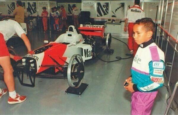 A young Lewis Hamilton in the McLaren garage.