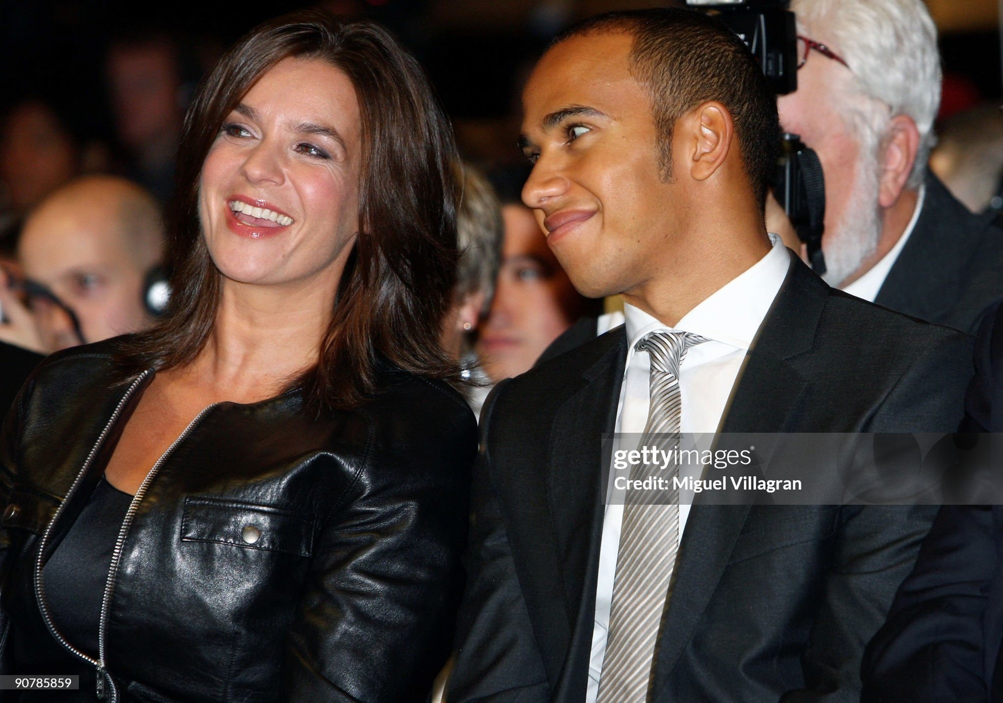 Former figure skating star Katarina Witt talks to Lewis Hamilton during the Mercedes-Benz presentation of the SLS AMG at the international motor show IAA on 15 September 2009 in Frankfurt am Main, Germany. 