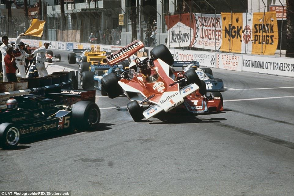 James Hunt runs into trouble at the start of the 1977 race, as the world champion's McLaren climbs over British compatriot's John Watson and his Brabham as the duo enter turn one (Cook's Corner) on the opening lap.