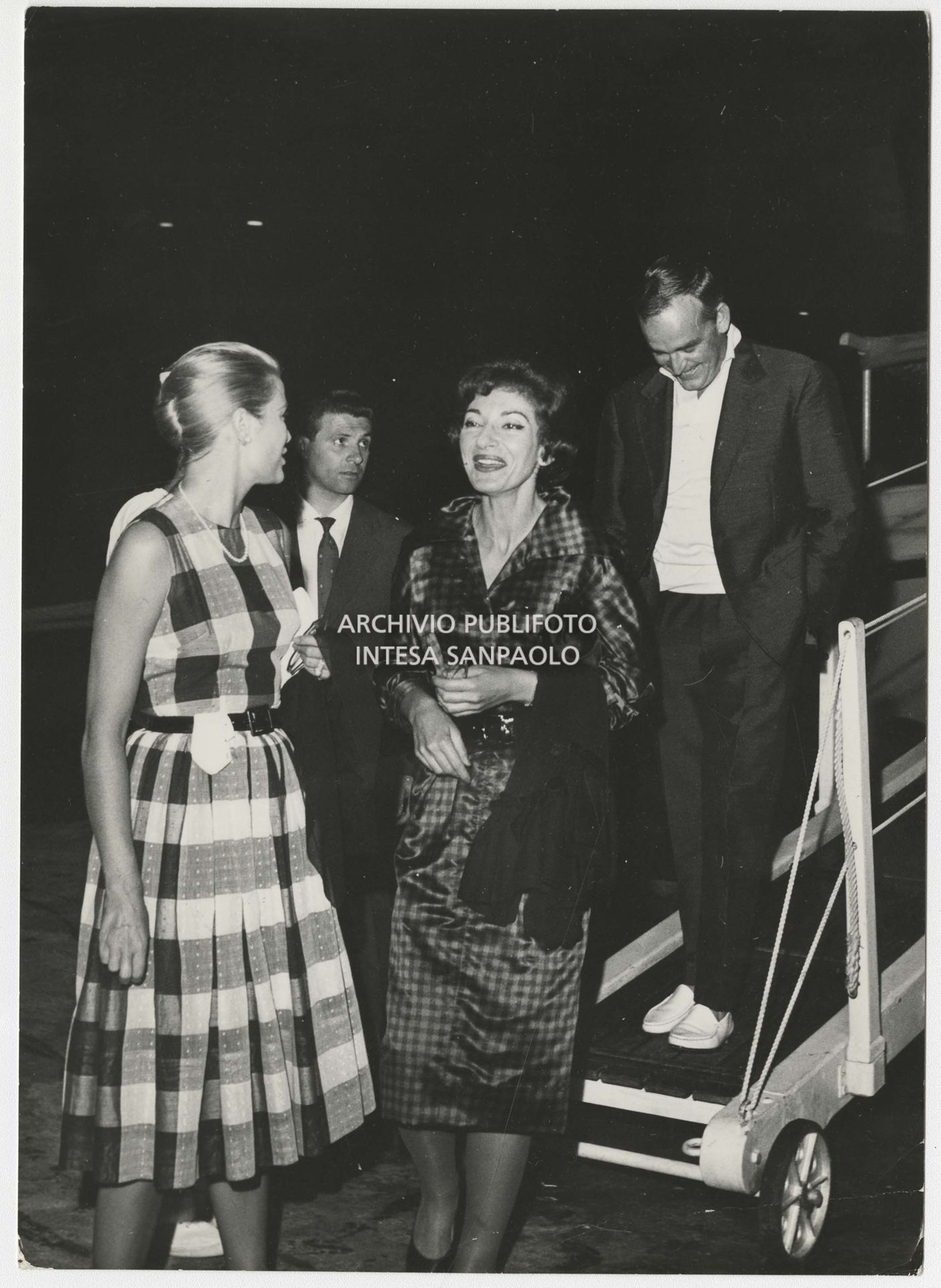 Maria Callas with Grace Kelly and Prince Rainier III of Monaco in Palermo on 13 September 1960. 