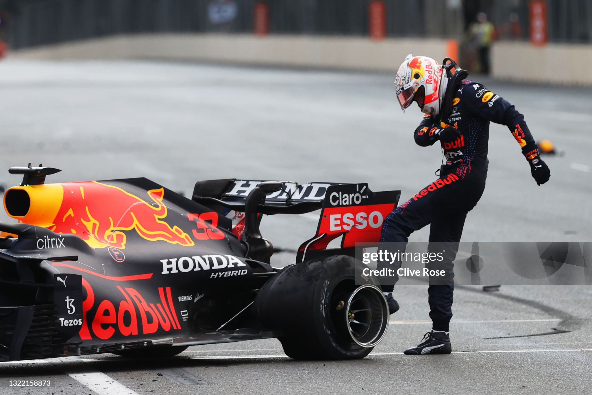 Max Verstappen kicks his tyre as he reacts after crashing during the F1 Grand Prix of Azerbaijan at Baku City Circuit on 06 June 2021 in Baku, Azerbaijan. 