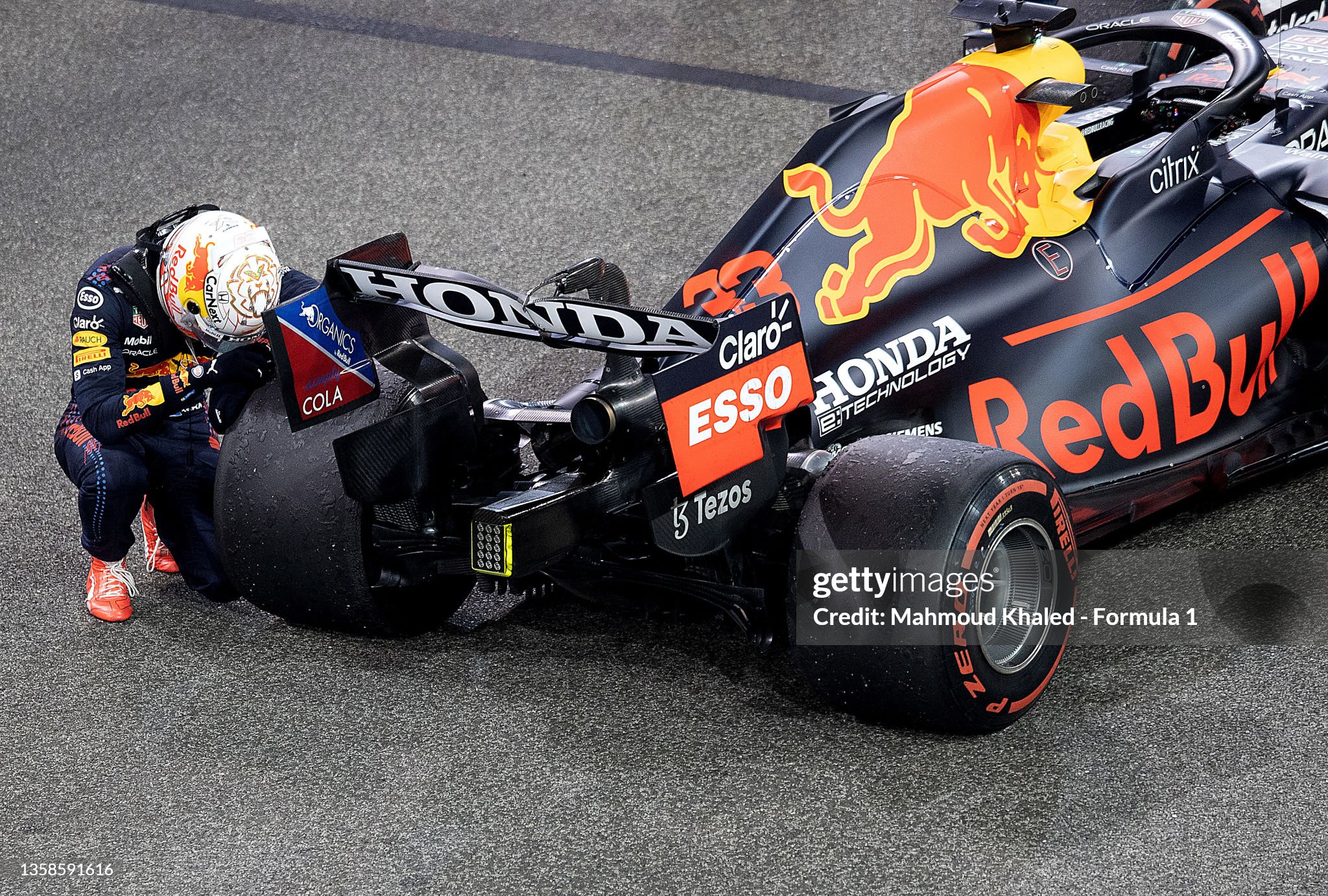 Race winner and 2021 F1 World Drivers Champion Max Verstappen of the Netherlands and Red Bull Racing celebrates in parc ferme after the F1 Grand Prix of Abu Dhabi at Yas Marina Circuit on December 12, 2021 in Abu Dhabi, United Arab Emirates. 