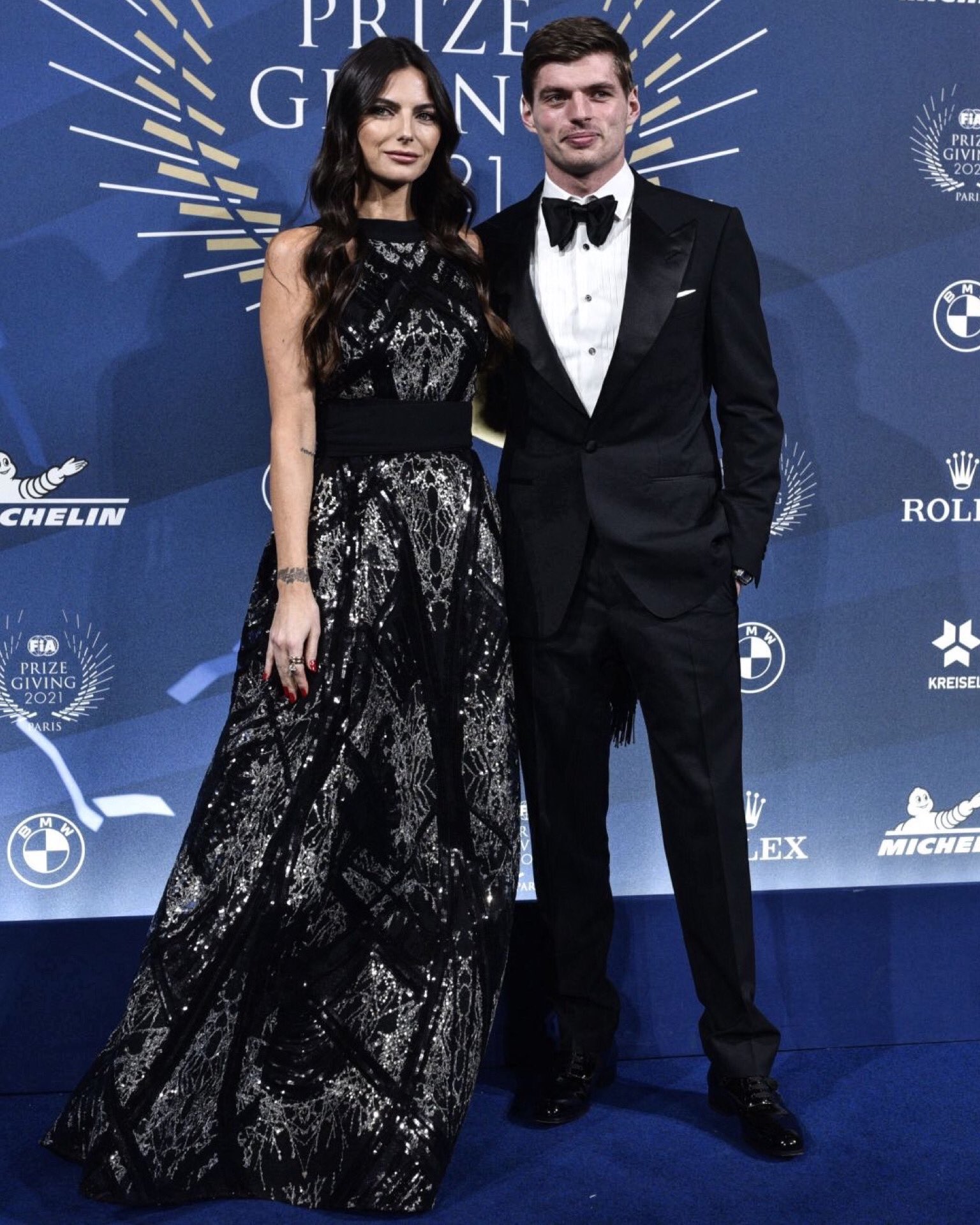 F1 World Champion Max Verstappen of Red Bull Racing poses with Kelly Piquet during the FIA Prize Giving ceremony on December 16, 2021 in Paris, France.