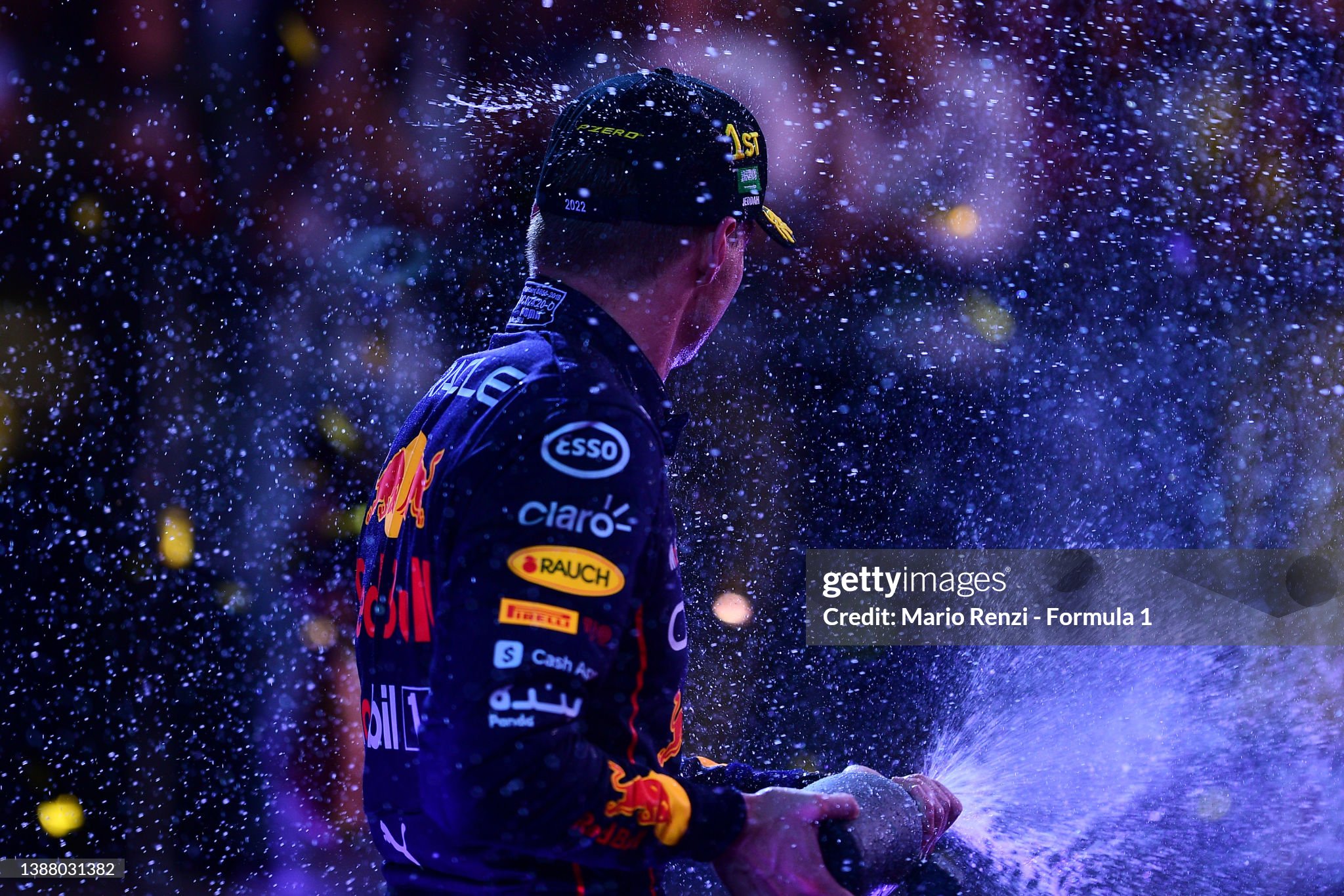 Race winner Max Verstappen celebrates on the podium during the F1 Grand Prix of Saudi Arabia at the Jeddah Corniche Circuit on March 27, 2022.