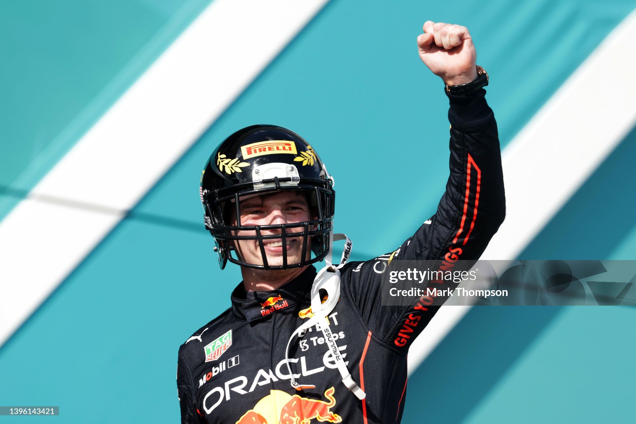 Max Verstappen celebrates on the podium during the F1 Grand Prix of Miami at the Miami International Autodrome on May 08, 2022 in Miami, Florida. 