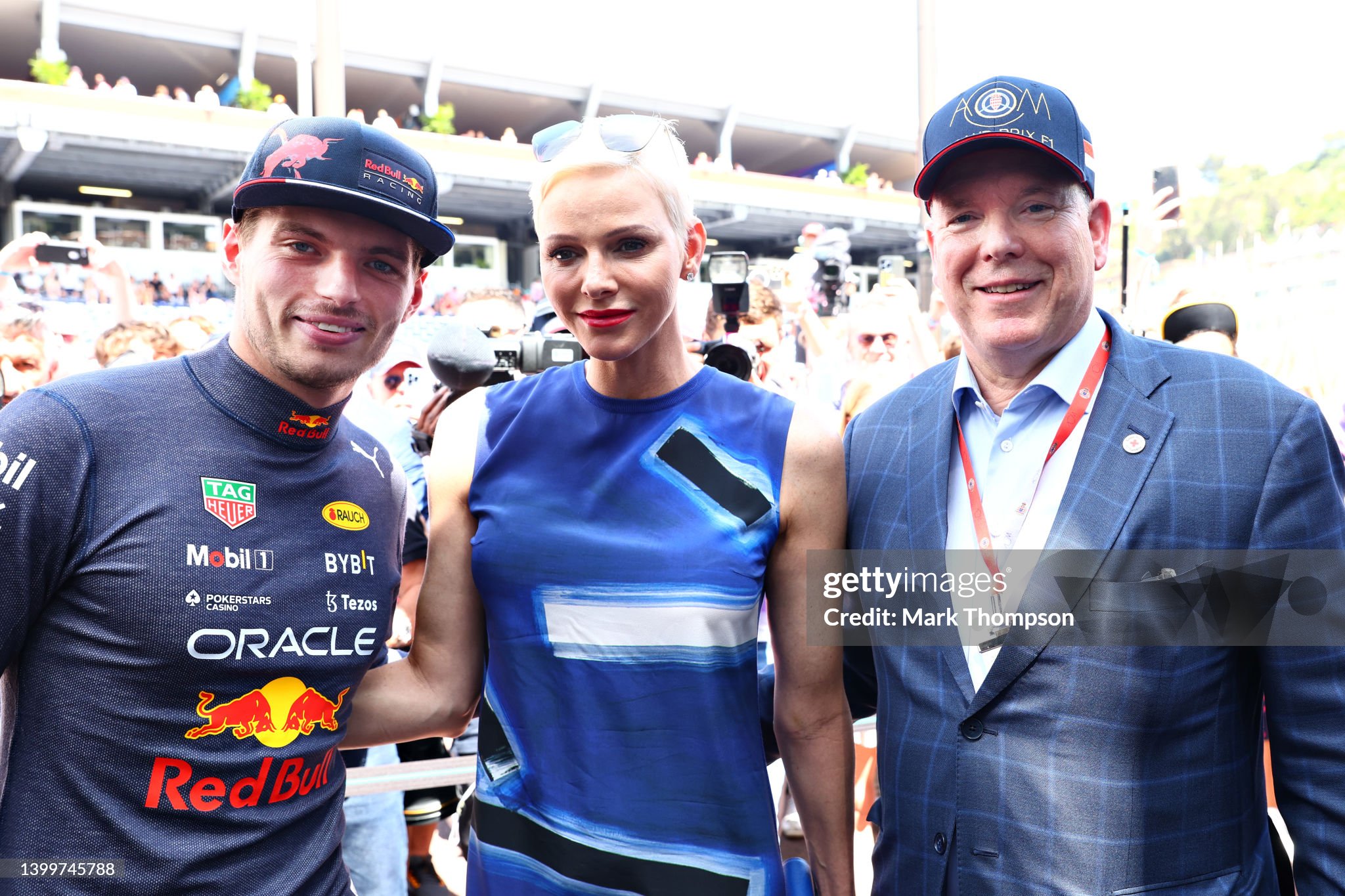 Princess Charlene of Monaco and Prince Albert of Monaco pose for a photo prior to qualifying ahead of the F1 Grand Prix of Monaco at Circuit de Monaco on May 28, 2022 in Monte-Carlo, Monaco. 