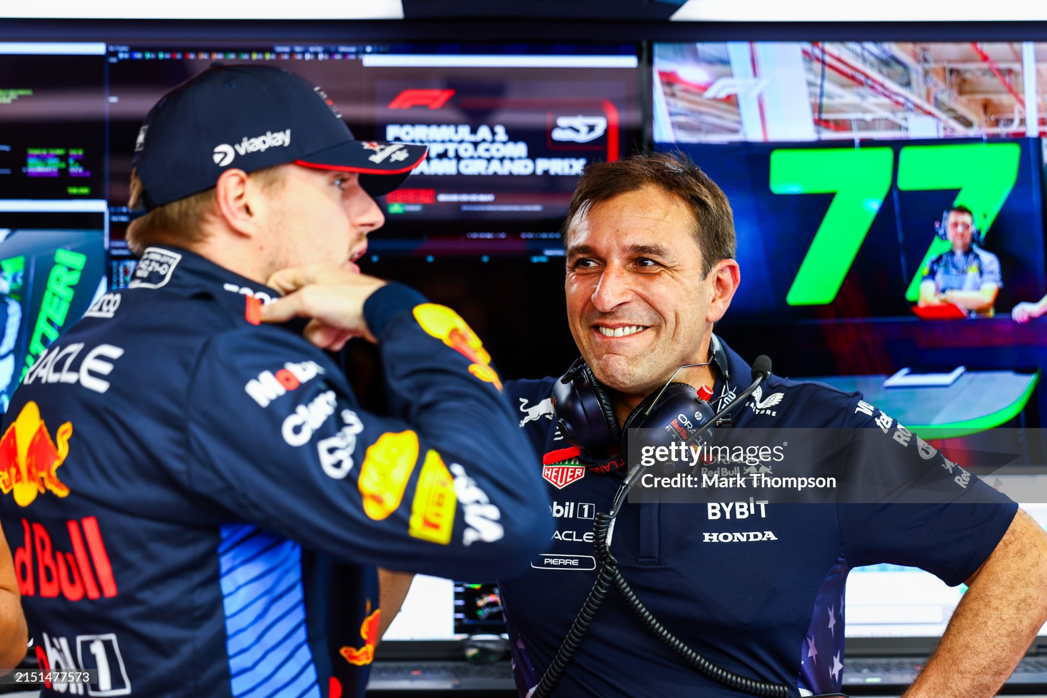 Max Verstappen and Pierre Wache, chief engineer of performance engineering at Red Bull, talk in the garage during qualifying ahead of the F1 Grand Prix of Miami at Miami International Autodrome on May 04, 2024. 