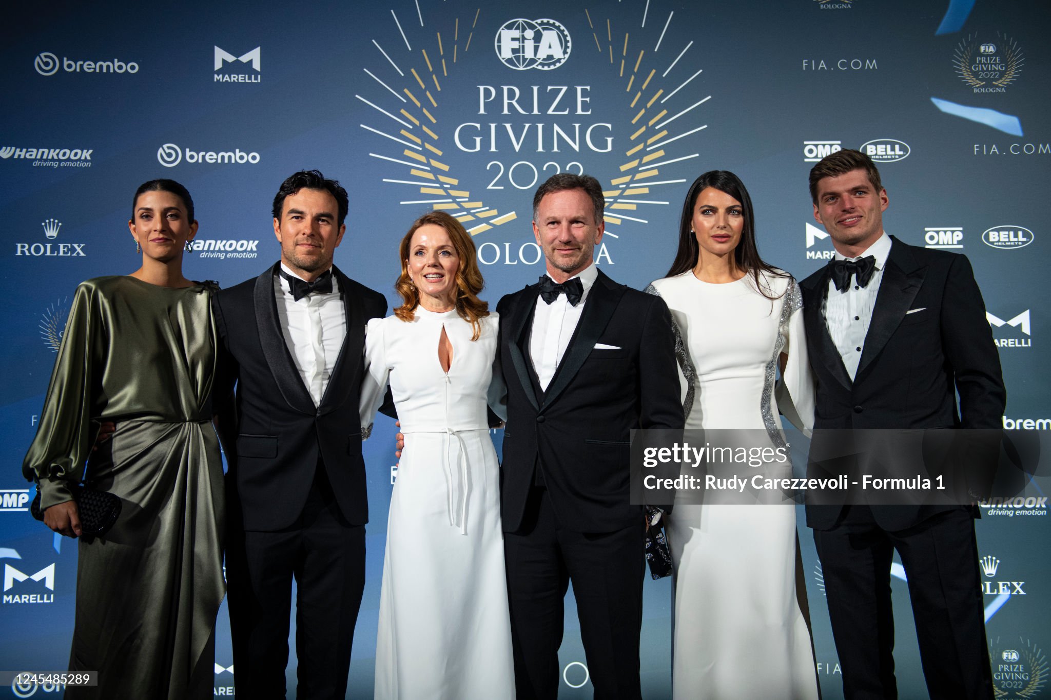 Carola Martinez and Sergio Pérez, Geri Halliwell and Christian Horner, Kelly Piquet and Max Verstappen during the FIA Prize Giving at Bologna Fiere on December 09, 2022 in Bologna, Italy. 