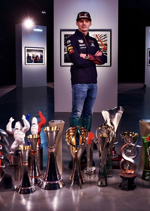 Max Verstappen with his trophies.