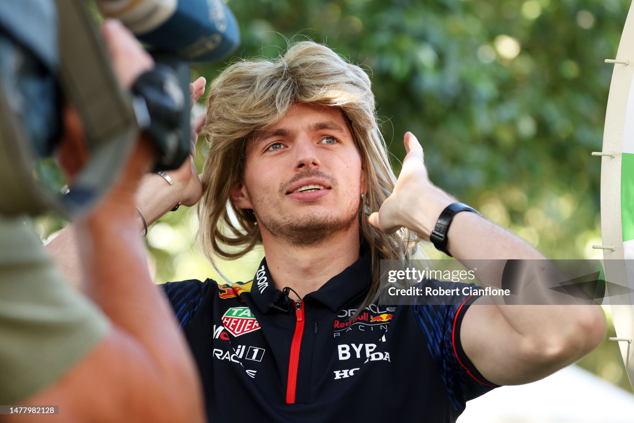 Max Verstappen wears a blonde wig in the paddock during previews ahead of the F1 Grand Prix of Australia at Albert Park Grand Prix Circuit on 30 March 2023 in Melbourne, Australia. 