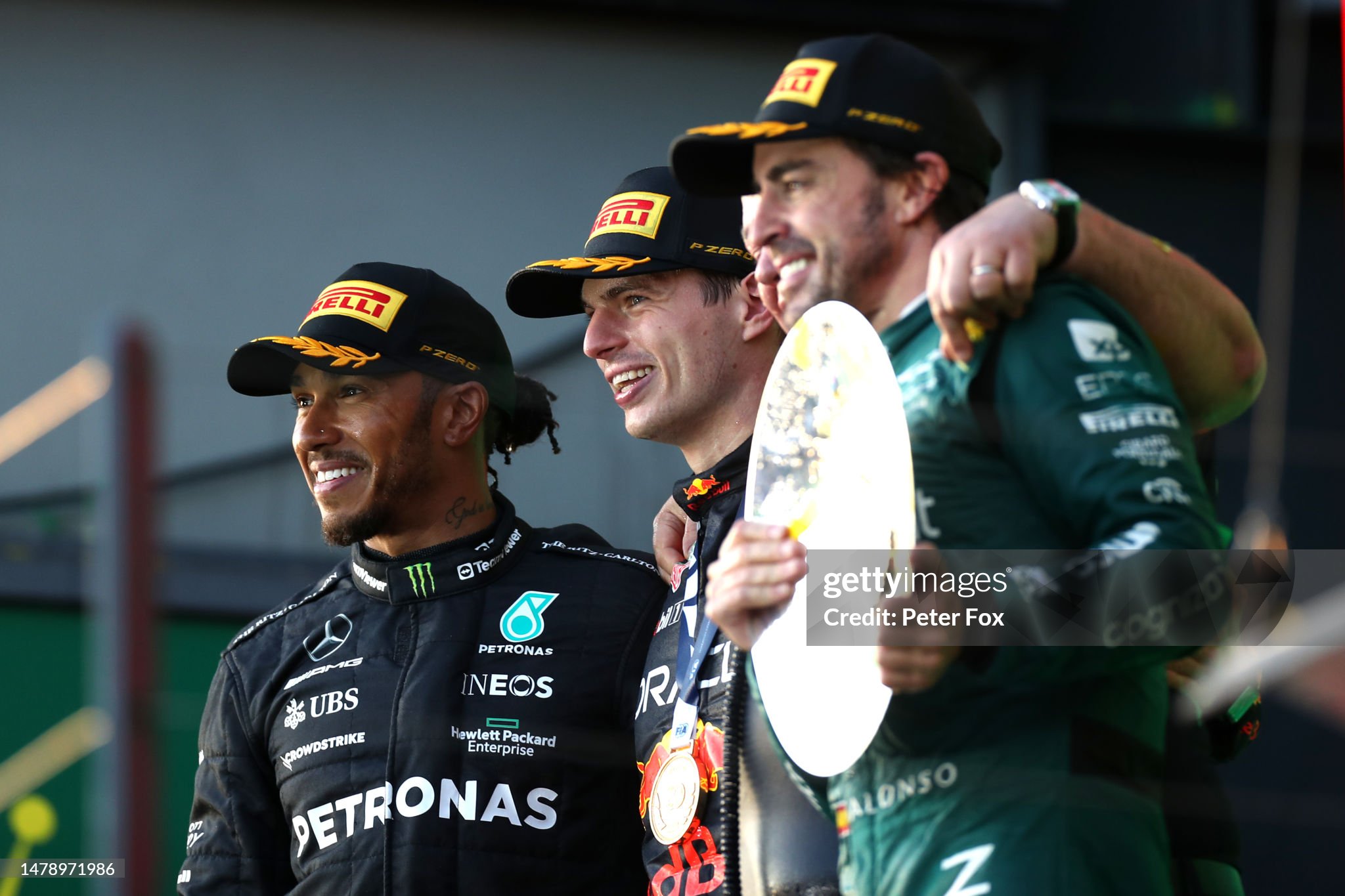 Race winner Max Verstappen, second placed Lewis Hamilton and third placed Fernando Alonso celebrate on the podium after the F1 Grand Prix of Australia at Albert Park Grand Prix Circuit on April 02, 2023. 