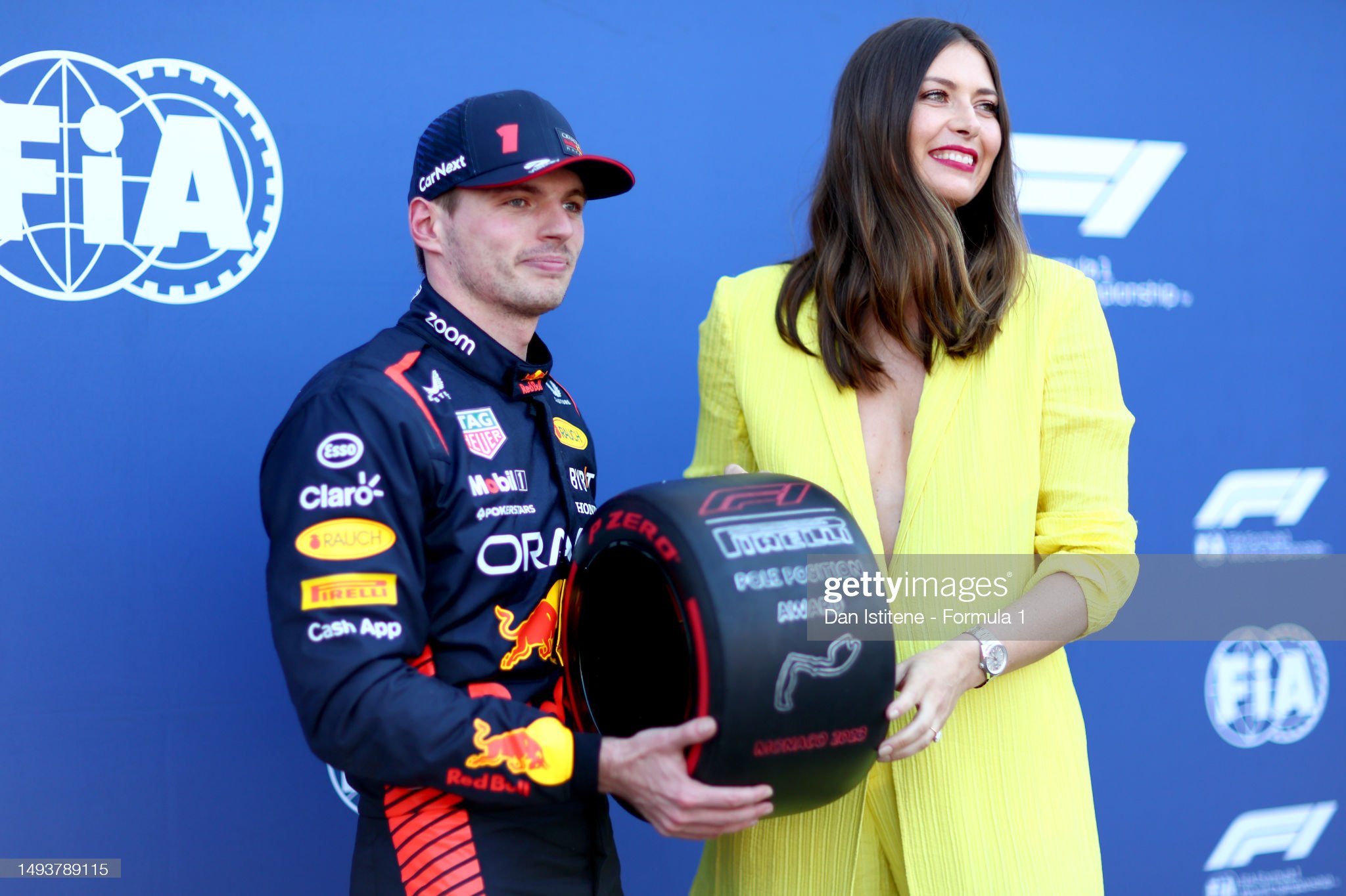 Pole position qualifier Max Verstappen is presented with the Pirelli Pole Position Award by Maria Sharapova after qualifying ahead of the F1 Grand Prix of Monaco at Circuit de Monaco on May 27, 2023. 