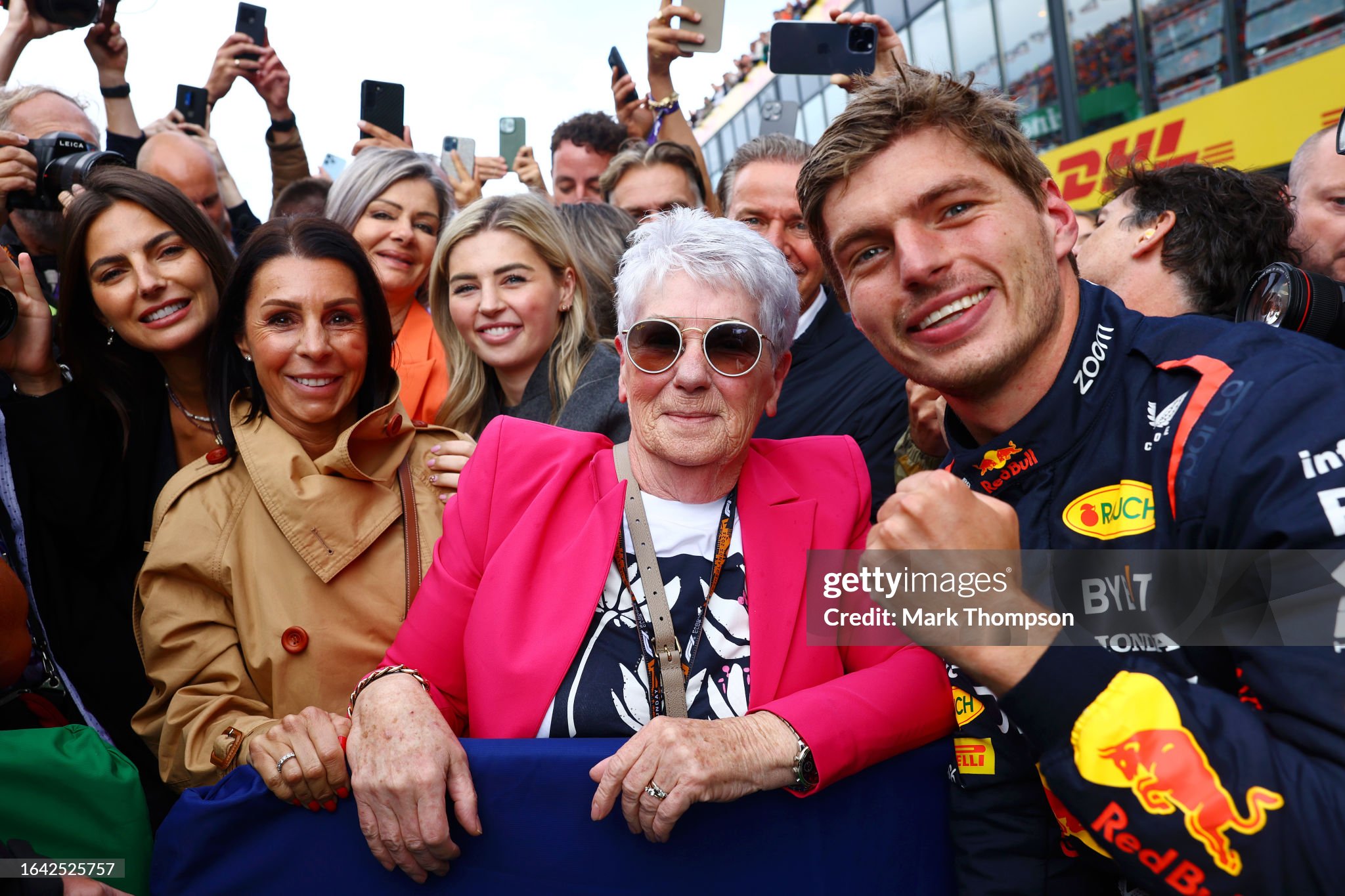 Race winner Max Verstappen celebrates with his grandmother in parc ferme after the F1 Grand Prix of the Netherlands at Zandvoort on August 27, 2023. 