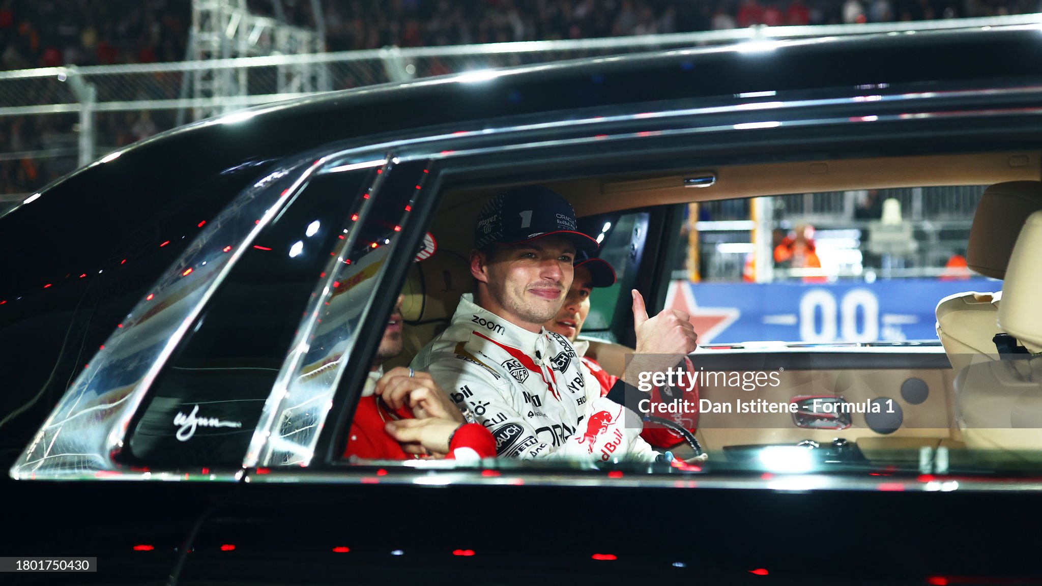 Max Verstappen celebrates on his way to the podium during the F1 Grand Prix of Las Vegas at Las Vegas Strip Circuit on November 18, 2023. 