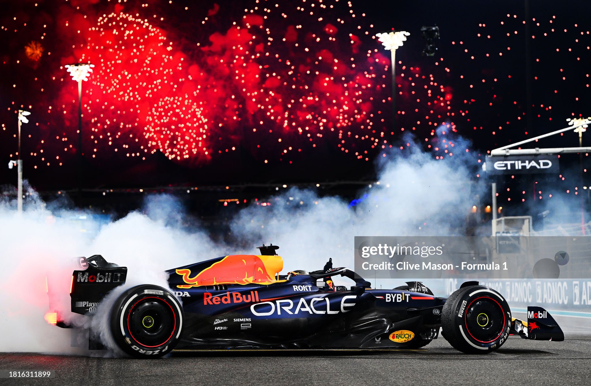 Race winner Max Verstappen performs donuts on track after the F1 Grand Prix of Abu Dhabi at Yas Marina Circuit on November 26, 2023.