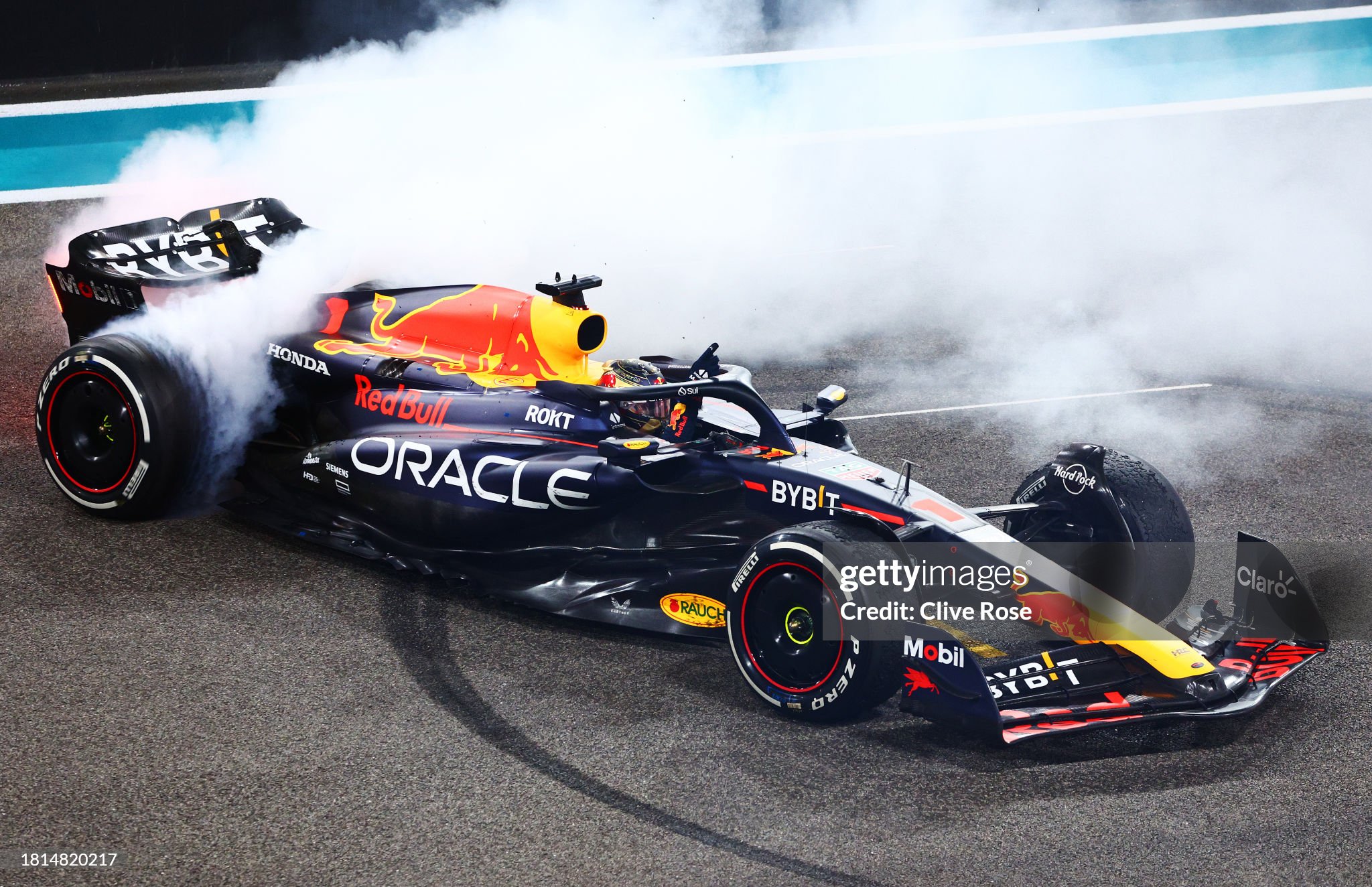 Race winner Max Verstappen performs donuts on track after the F1 Grand Prix of Abu Dhabi at Yas Marina Circuit on November 26, 2023. 