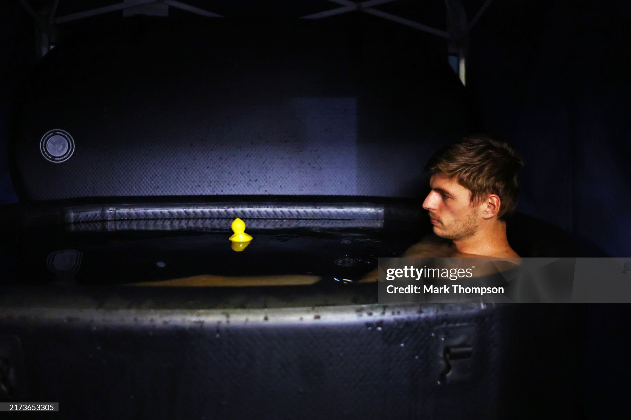 Max Verstappen has an ice bath in the paddock prior to qualifying ahead of the F1 Grand Prix of Singapore at Marina Bay Street Circuit on September 21, 2024. 