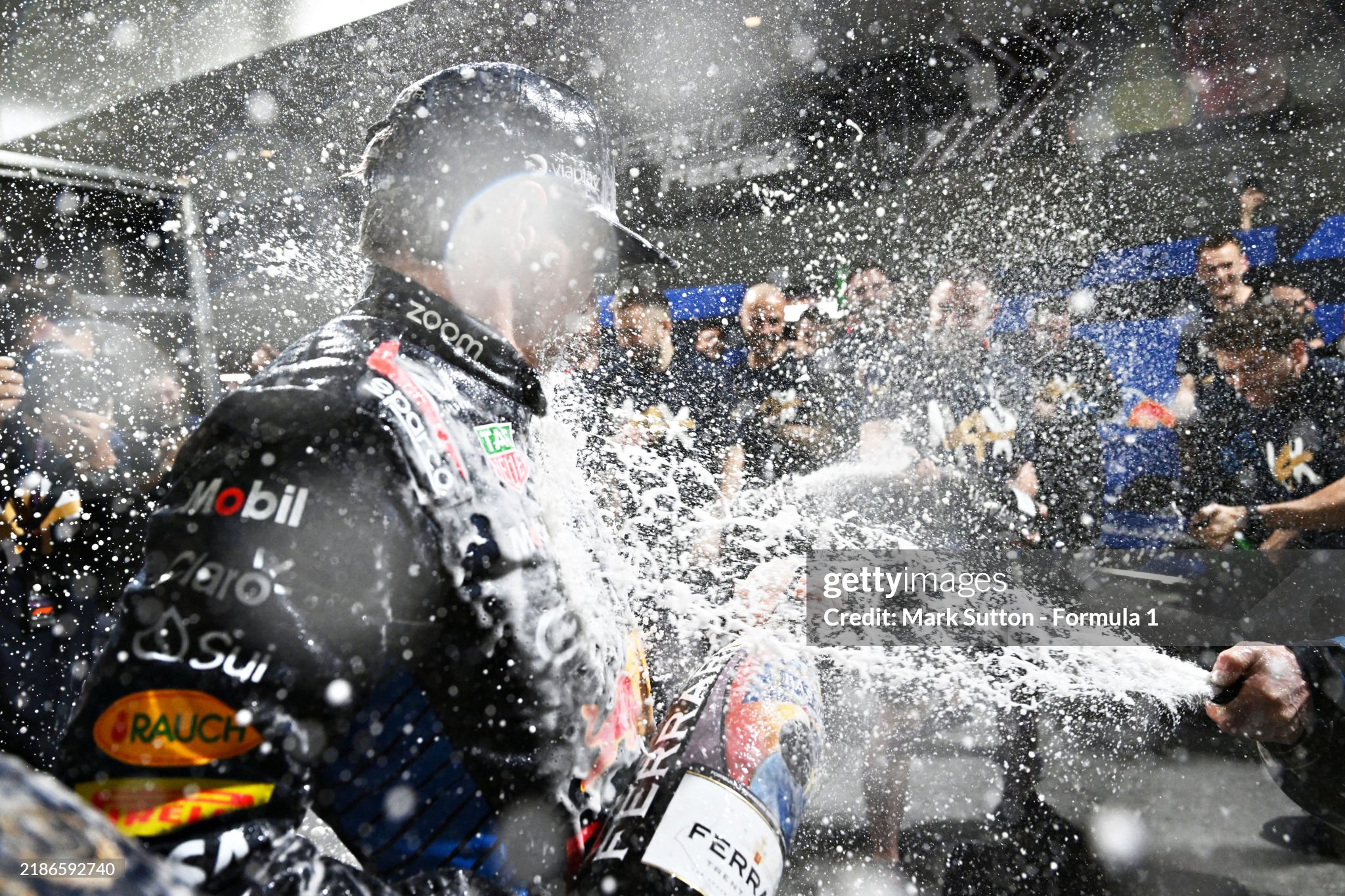 World Drivers Champion Max Verstappen of the Netherlands and Red Bull celebrates with his team after the F1 Grand Prix of Las Vegas at Las Vegas Strip Circuit on November 23, 2024. 