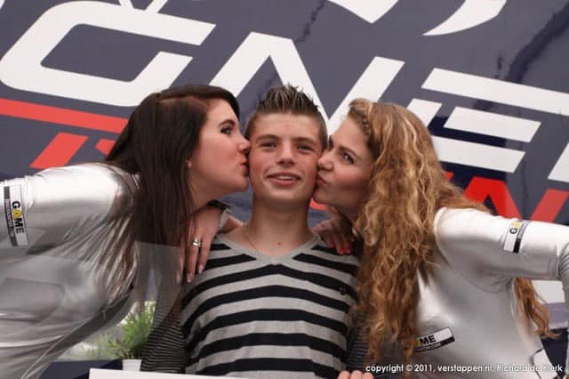 Max Verstappen kissed by two girls in 2011.