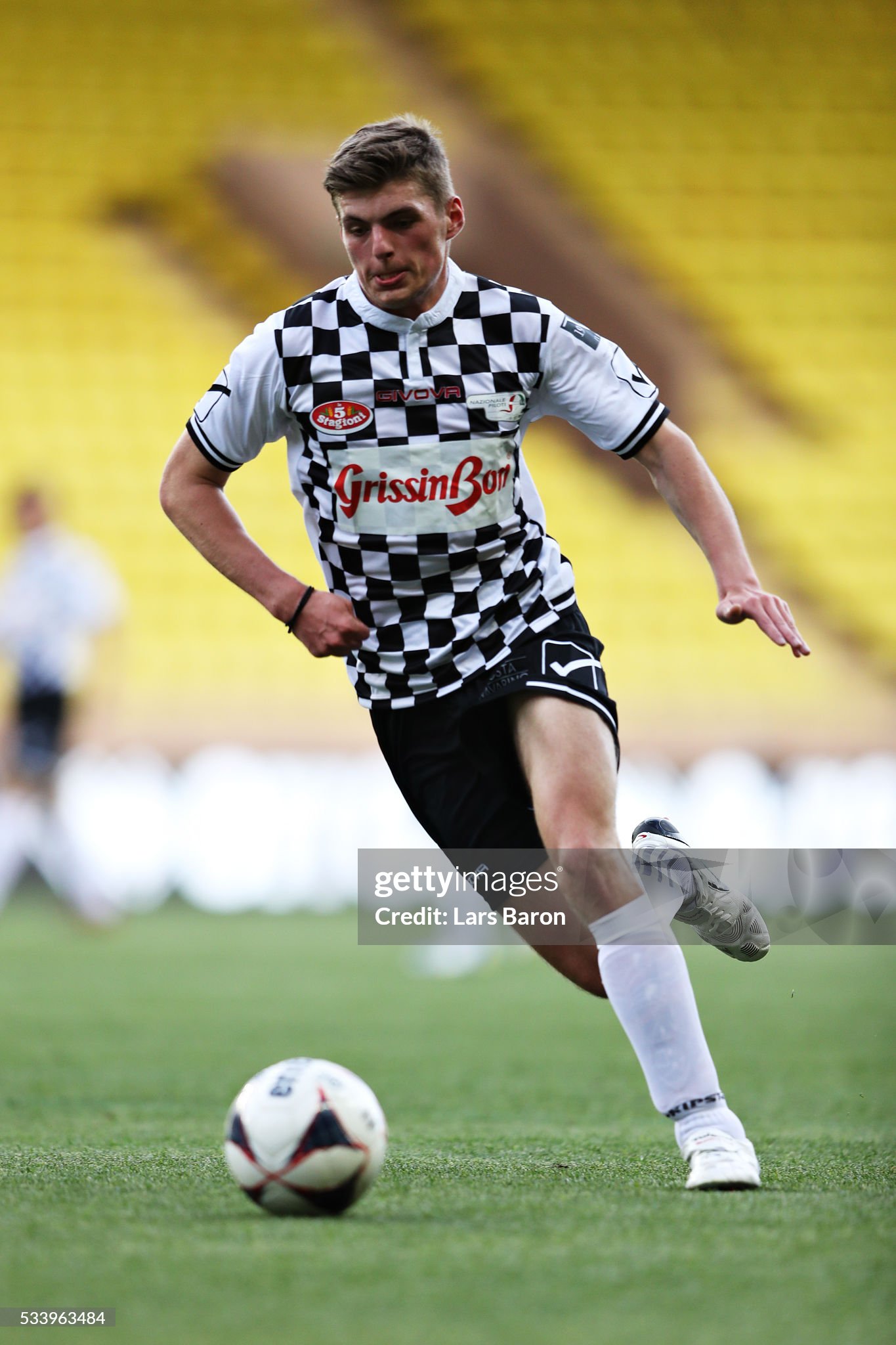 Max Verstappen runs with the ball during the 24th World Stars football match at Stade Louis II, Monaco, before the Monaco Formula One Grand Prix at Circuit de Monaco on May 24, 2016. 