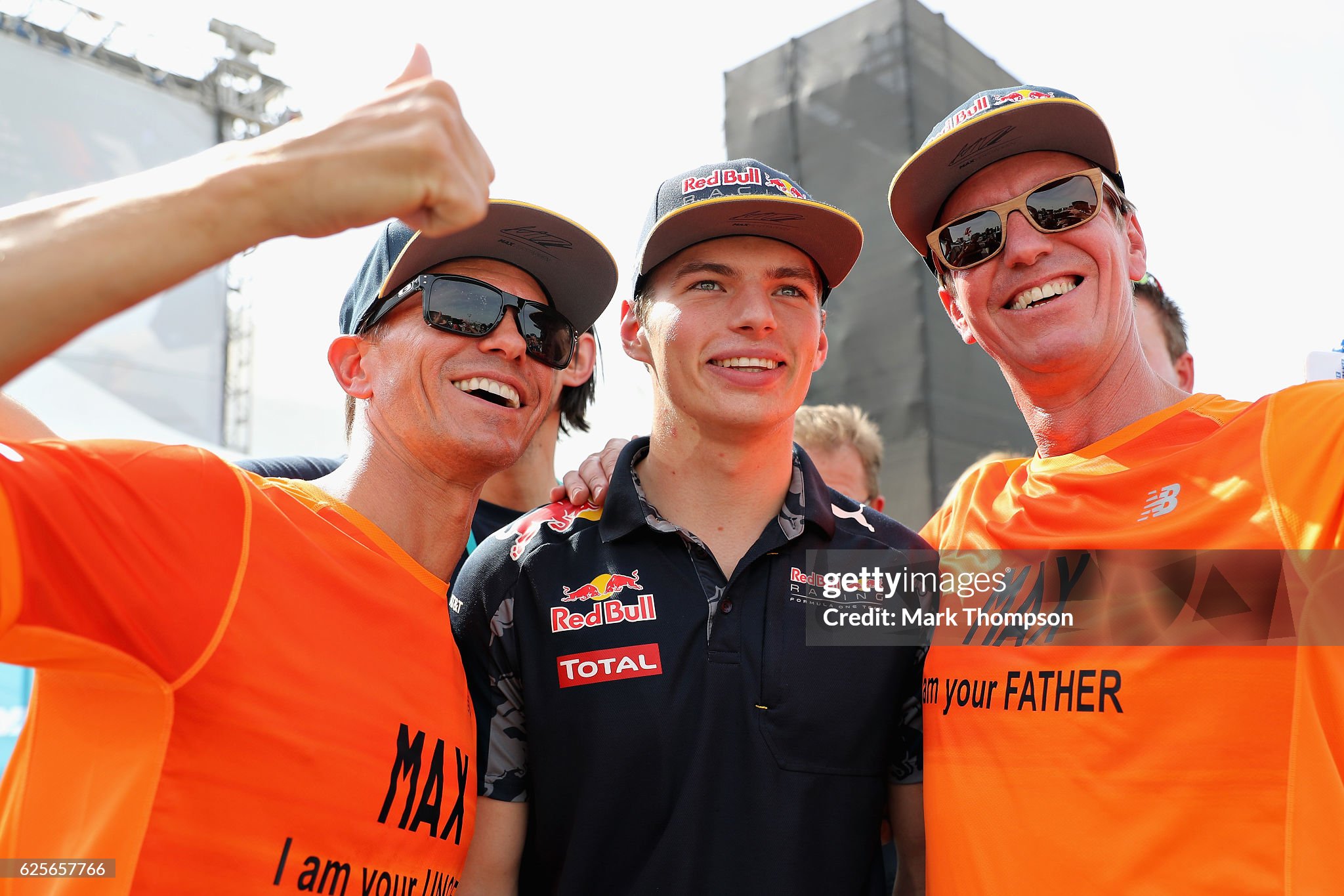 Max Verstappen poses for a photo with fans during practice for the Abu Dhabi Formula One Grand Prix at Yas Marina Circuit on 25 November 2016 in Abu Dhabi, United Arab Emirates. 