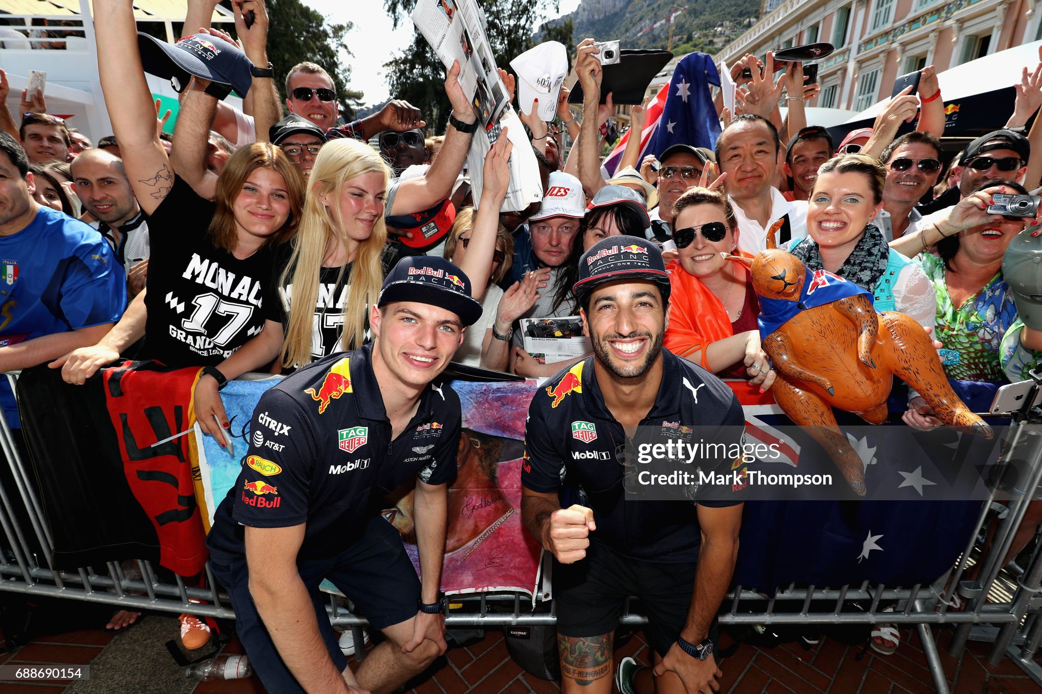 Daniel Ricciardo and Max Verstappen of the Netherlands and Red Bull Racing pose for a photo with fans during previews of the Monaco Formula One Grand Prix at Circuit de Monaco on May 26, 2017. 